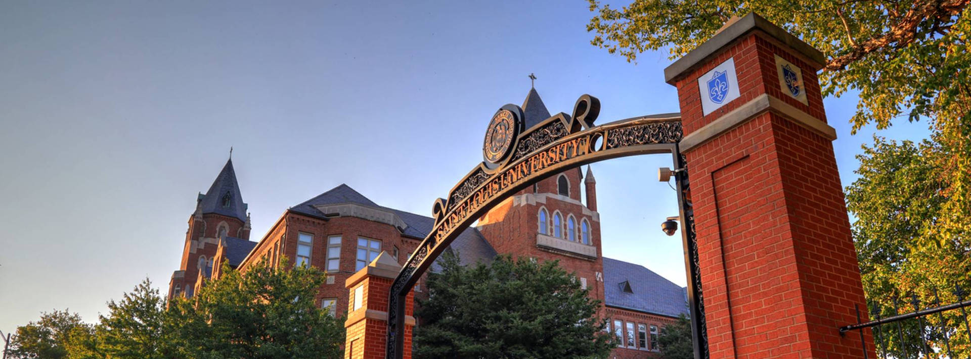 Historical Brick Arch At Saint Louis University Background