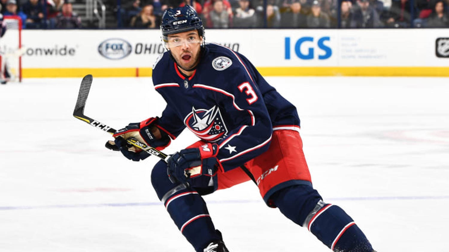 Hockey Player Seth Jones Waving Hockey Stick Background