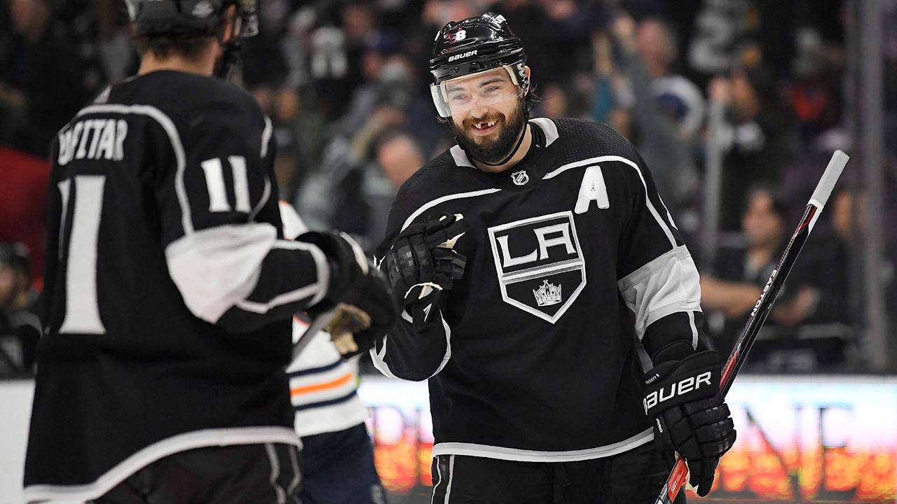 Hockey Star Drew Doughty Shares A Joyous Moment With Teammate Anze Kopitar Background