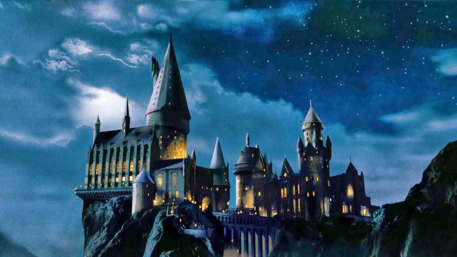 Hogwarts Castle At Night With Stars In The Sky Background