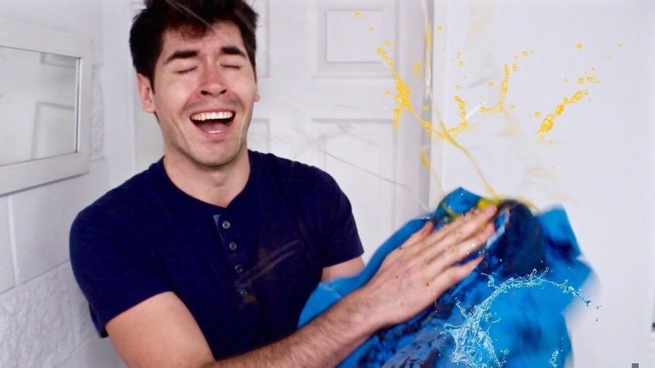 Holasoygerman Caressing A Blue Cloth Background