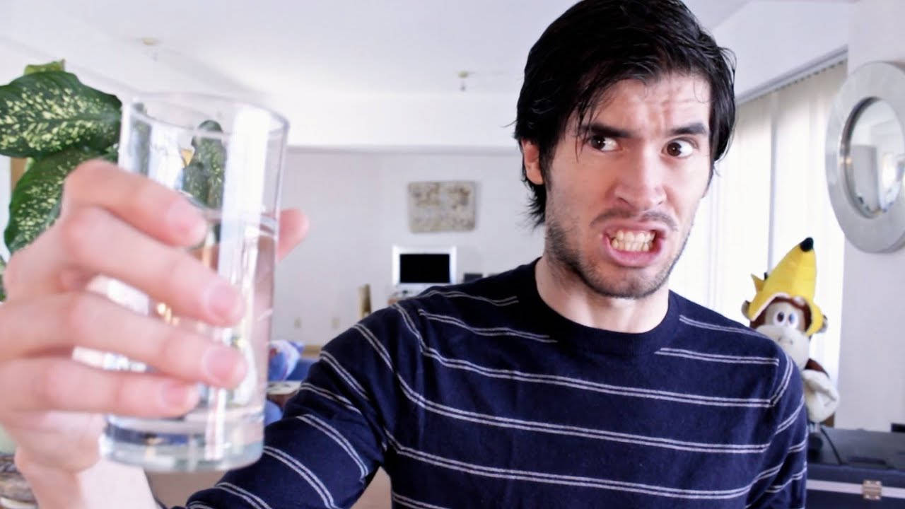 Holasoygerman Holding Glass Of Water Background