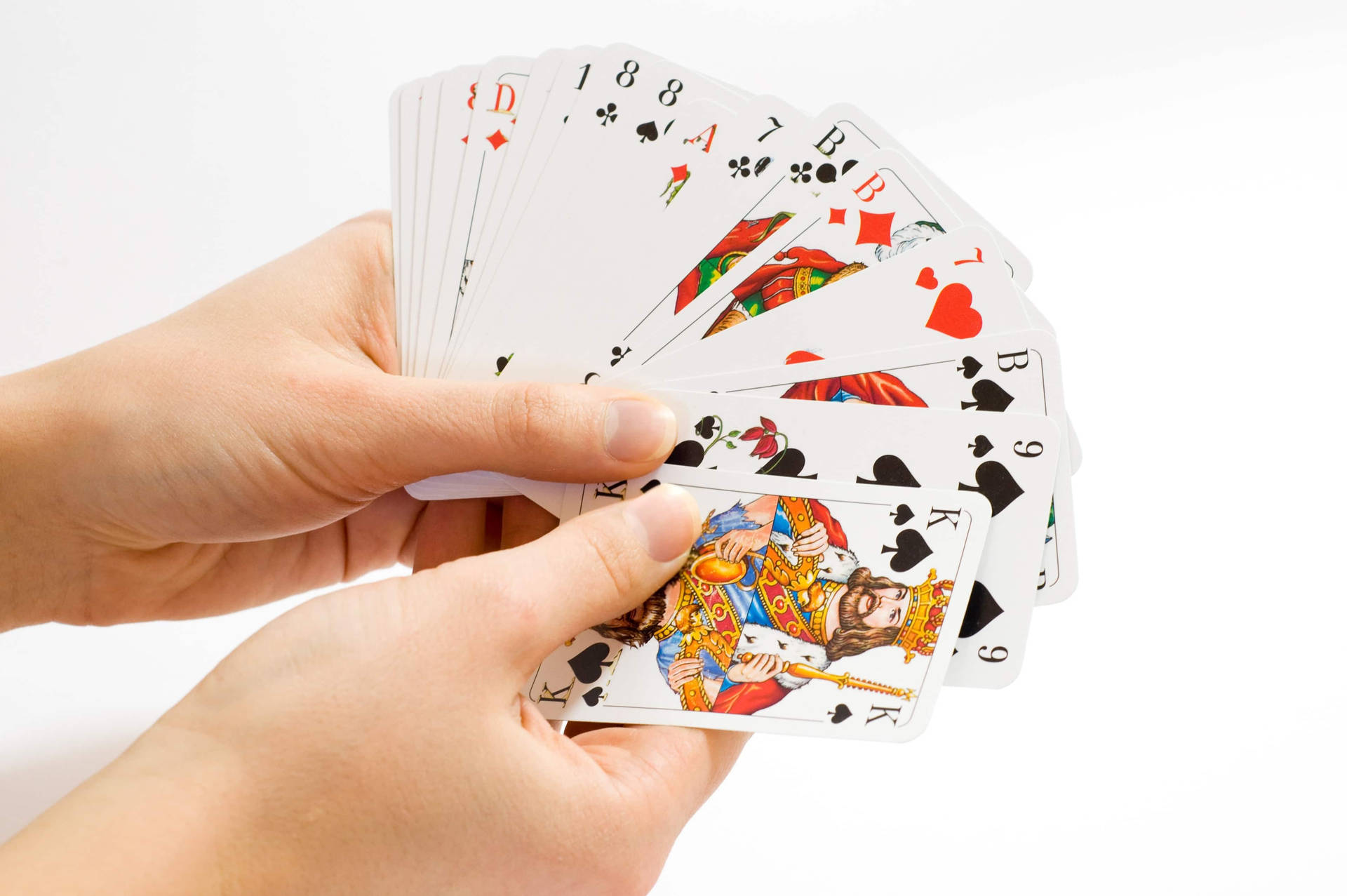 Holding A Rummy Deck Of Cards Background