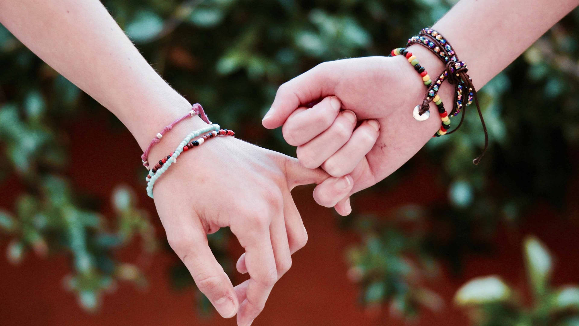 Holding Hands Pinky Promise Gesture Background