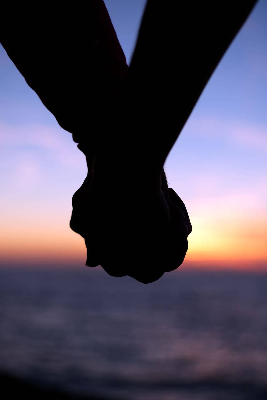 Holding Hands Silhouette In Horizon Sunset