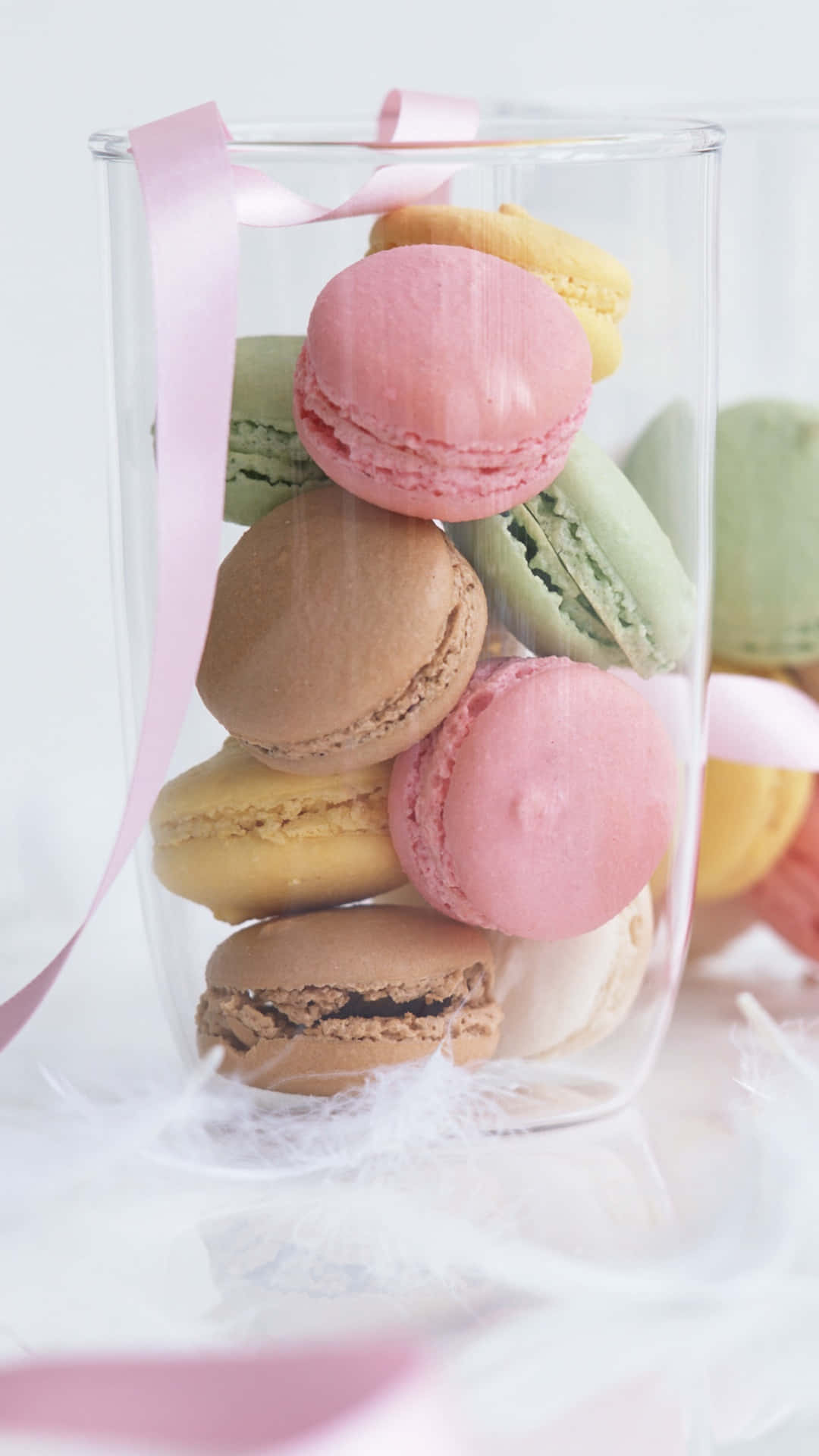 Holiday Gift Macaron In A Tall Glass Background