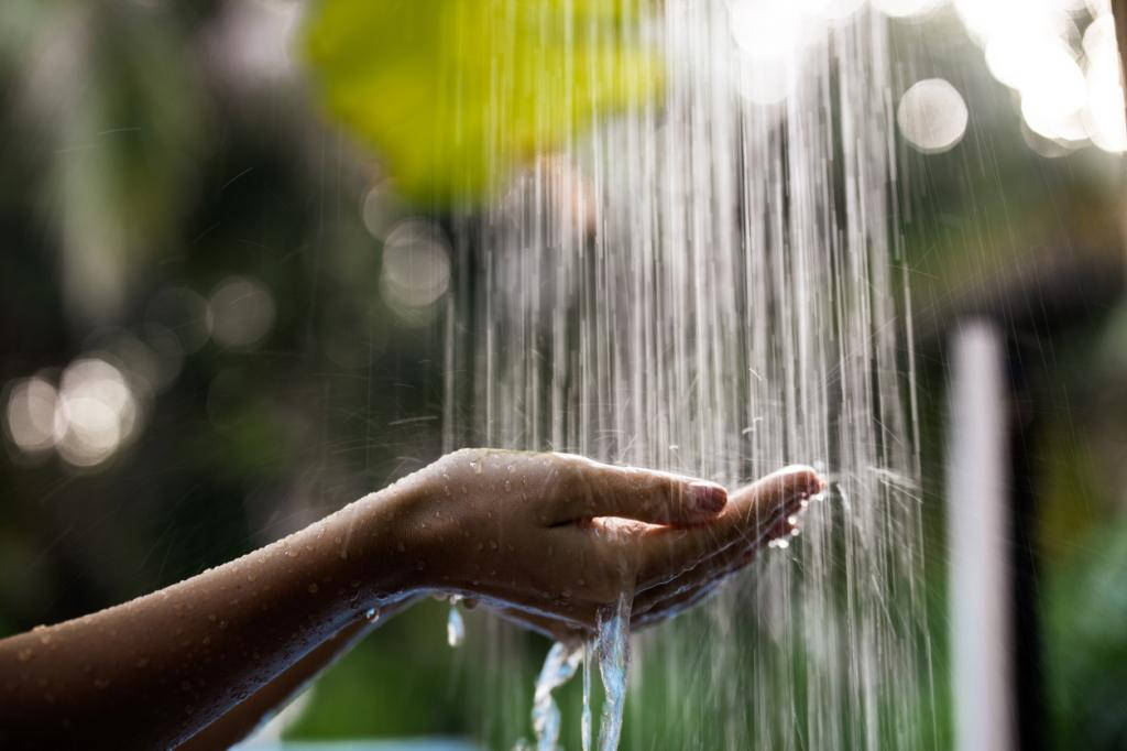 Holistic Hand Under Water Background