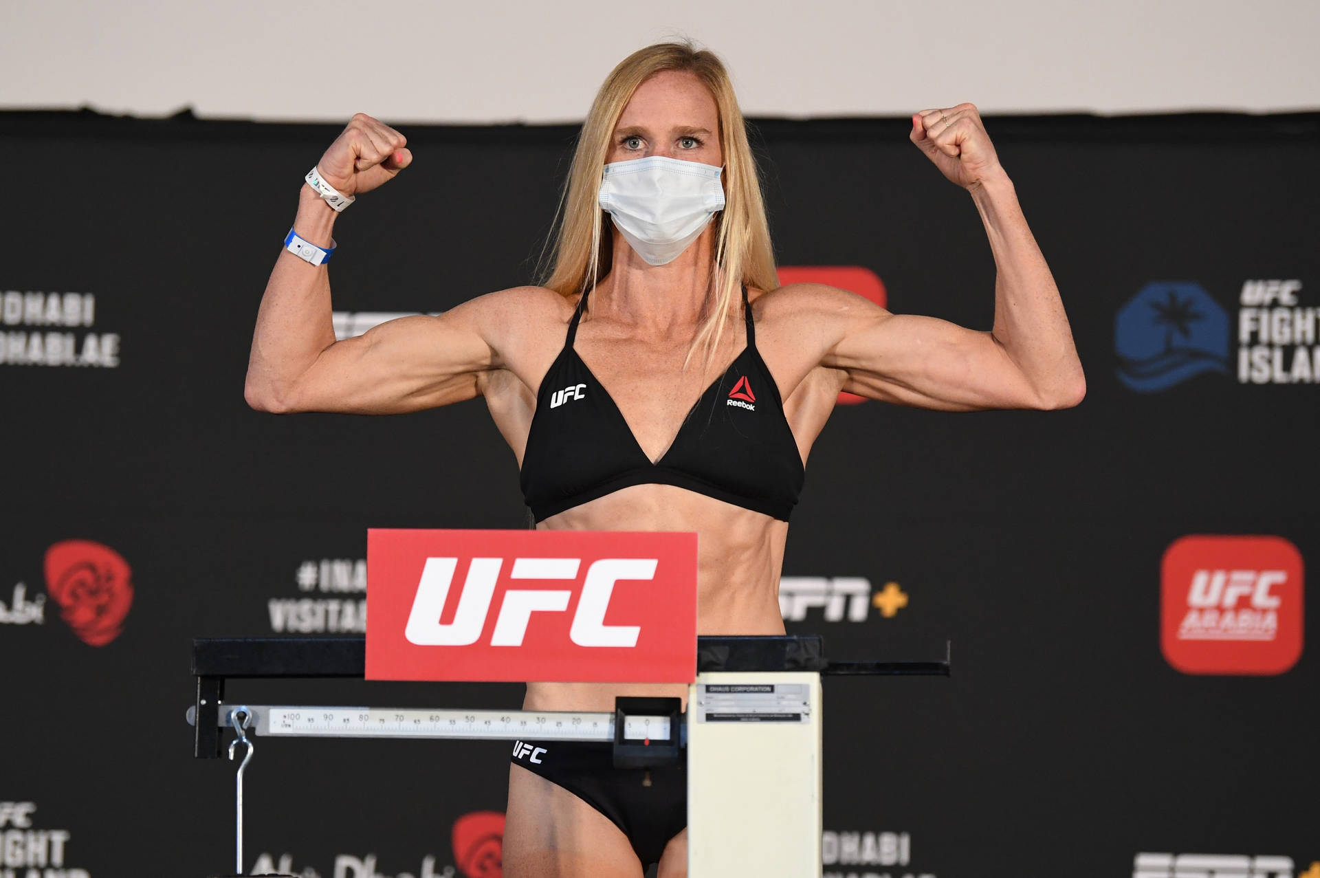 Holly Holm Flexing Biceps