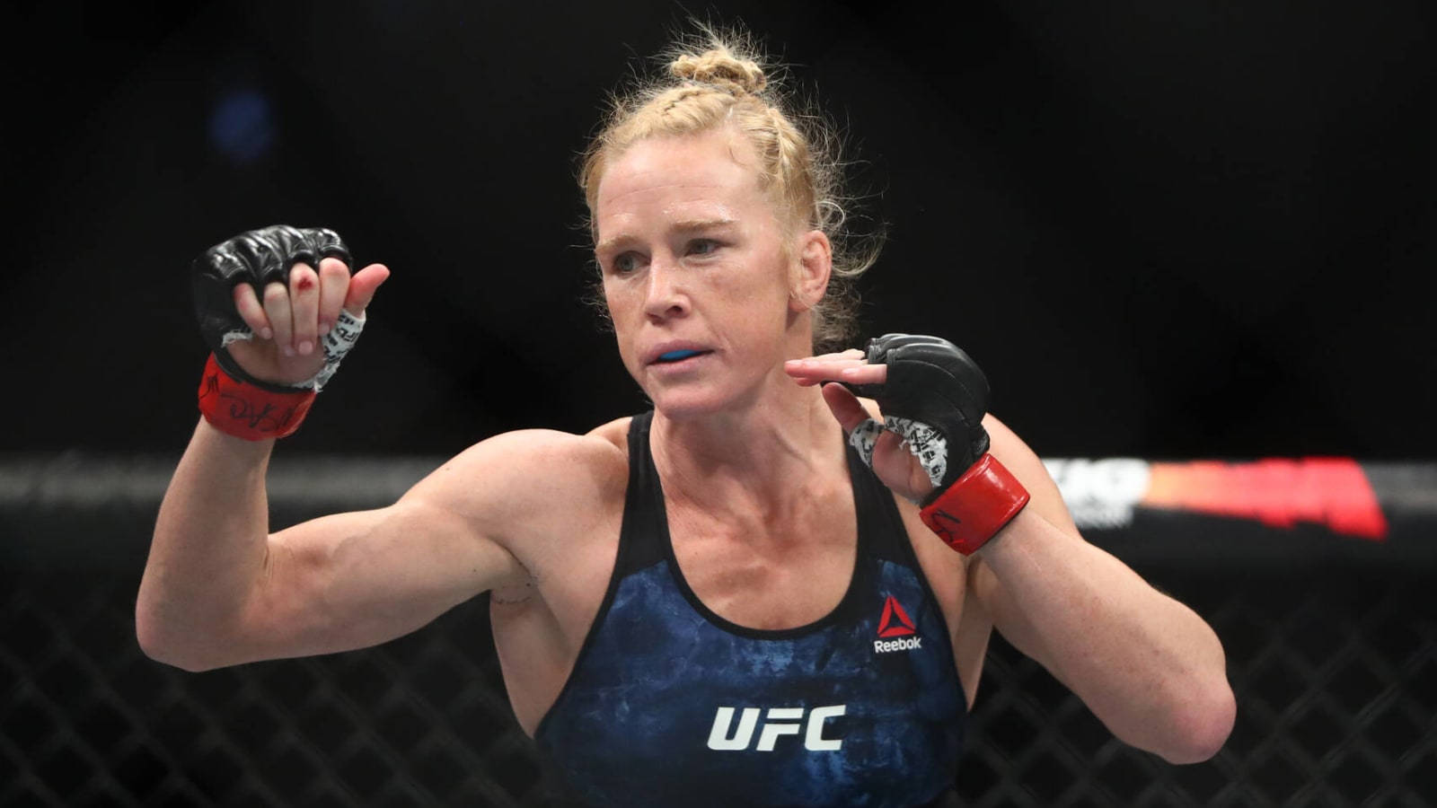 Holly Holm Mma Fight Stance Background