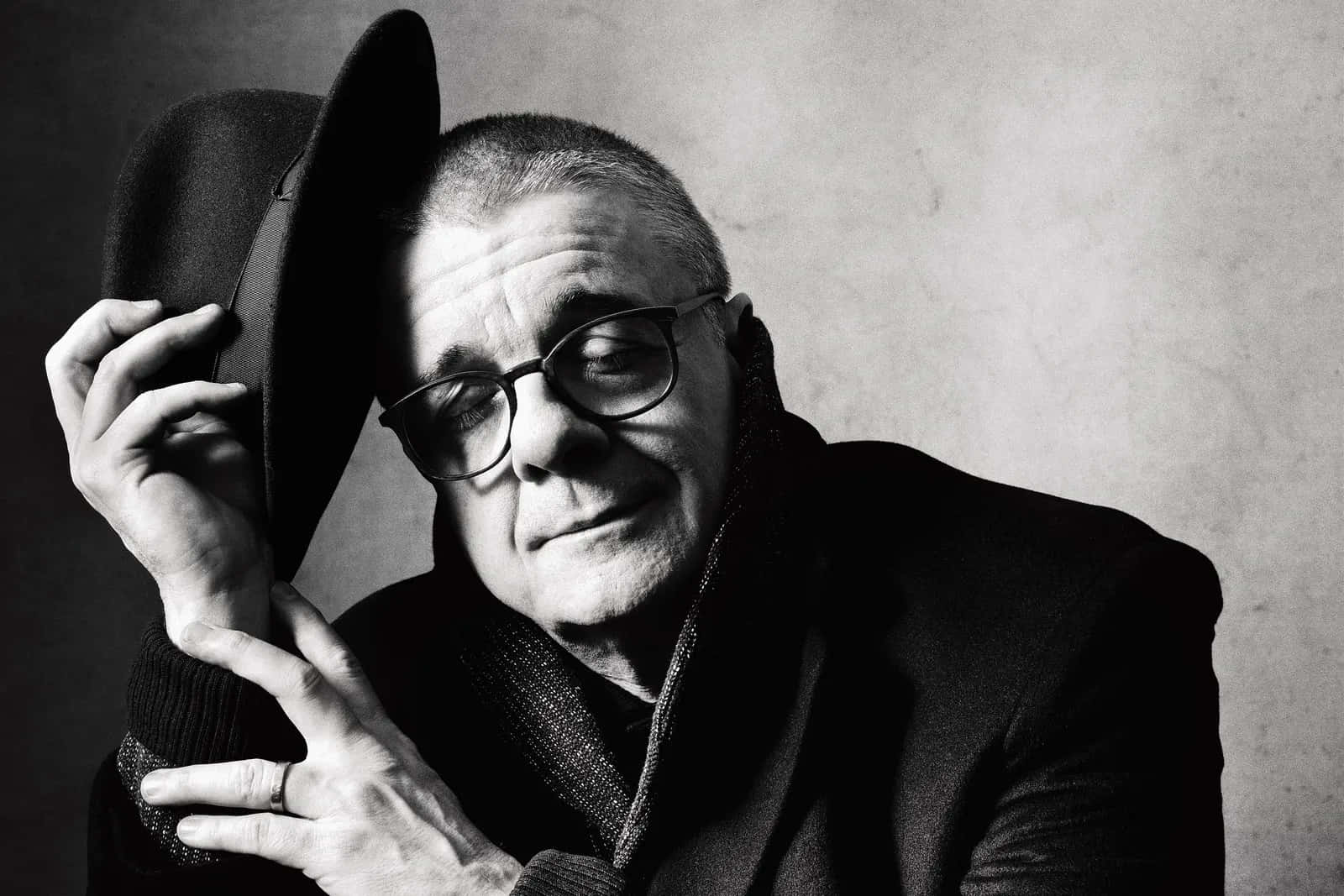 Hollywood Actor Nathan Lane In A Relaxed Pose Background