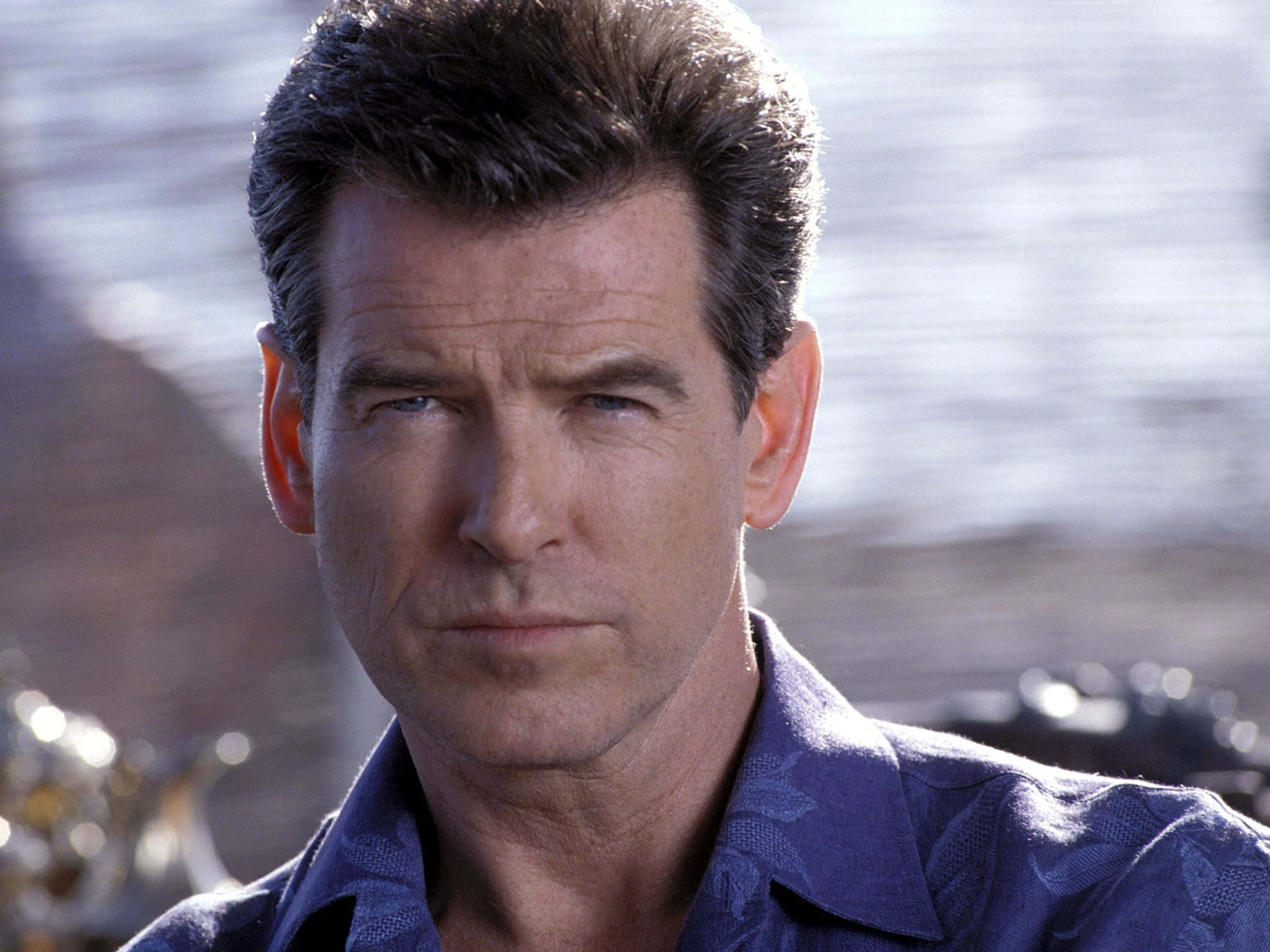 Hollywood Actor Pierce Brosnan In A Suave Pose Background