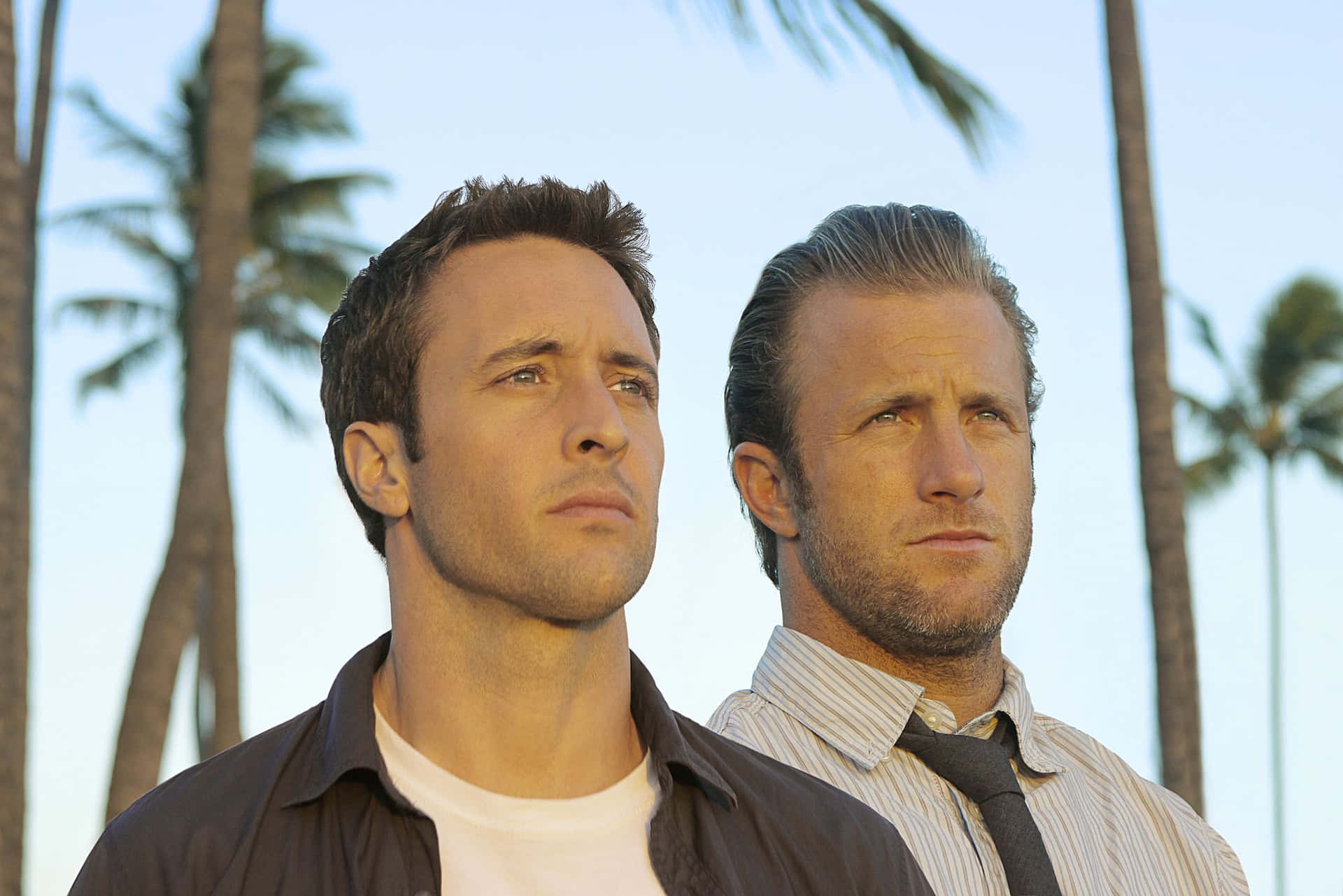 Hollywood Actors Scott Caan And Alex O'loughlin Posing For A Photoshoot Background