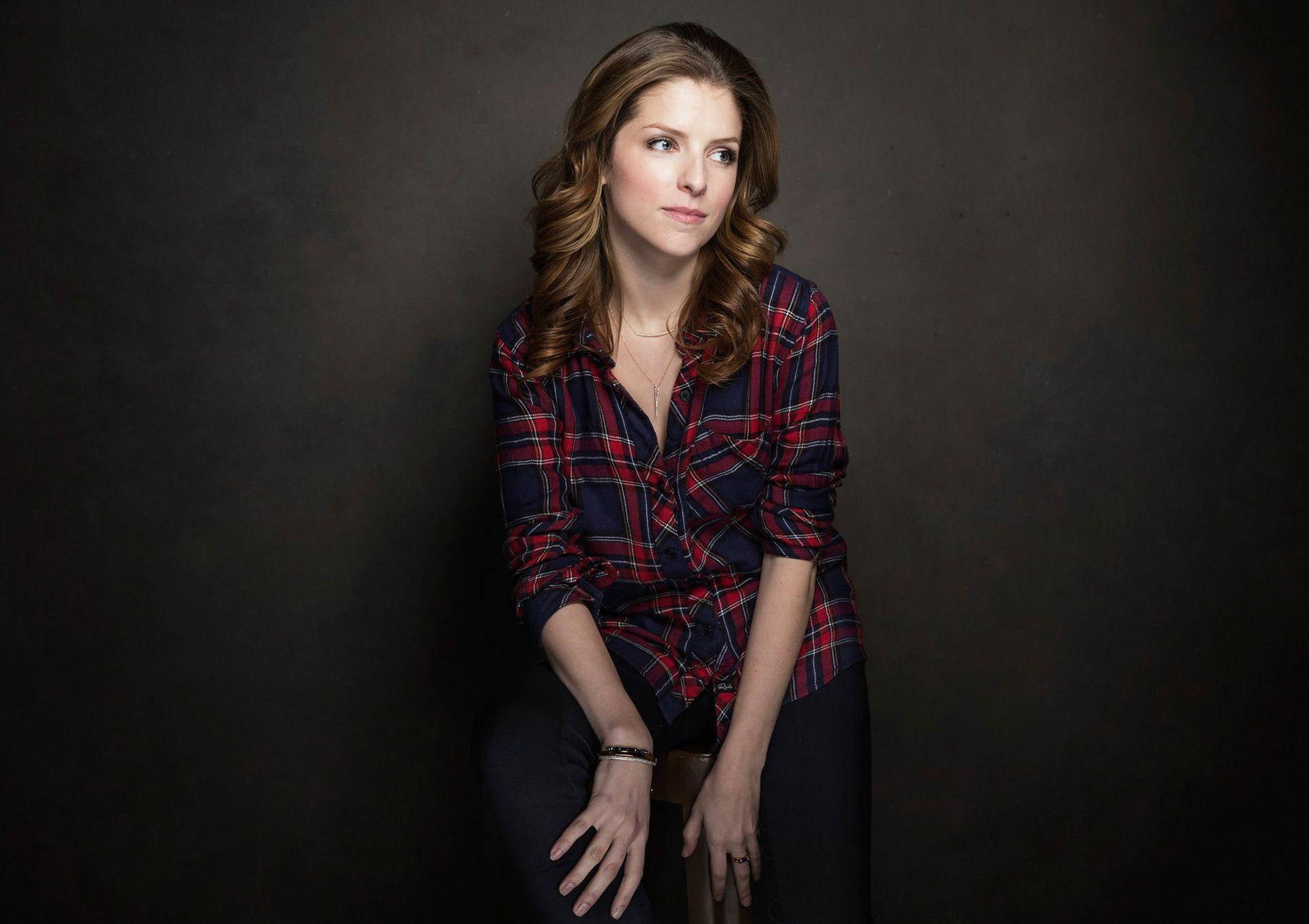Hollywood Actress Anna Kendrick In Plaid Shirt Background