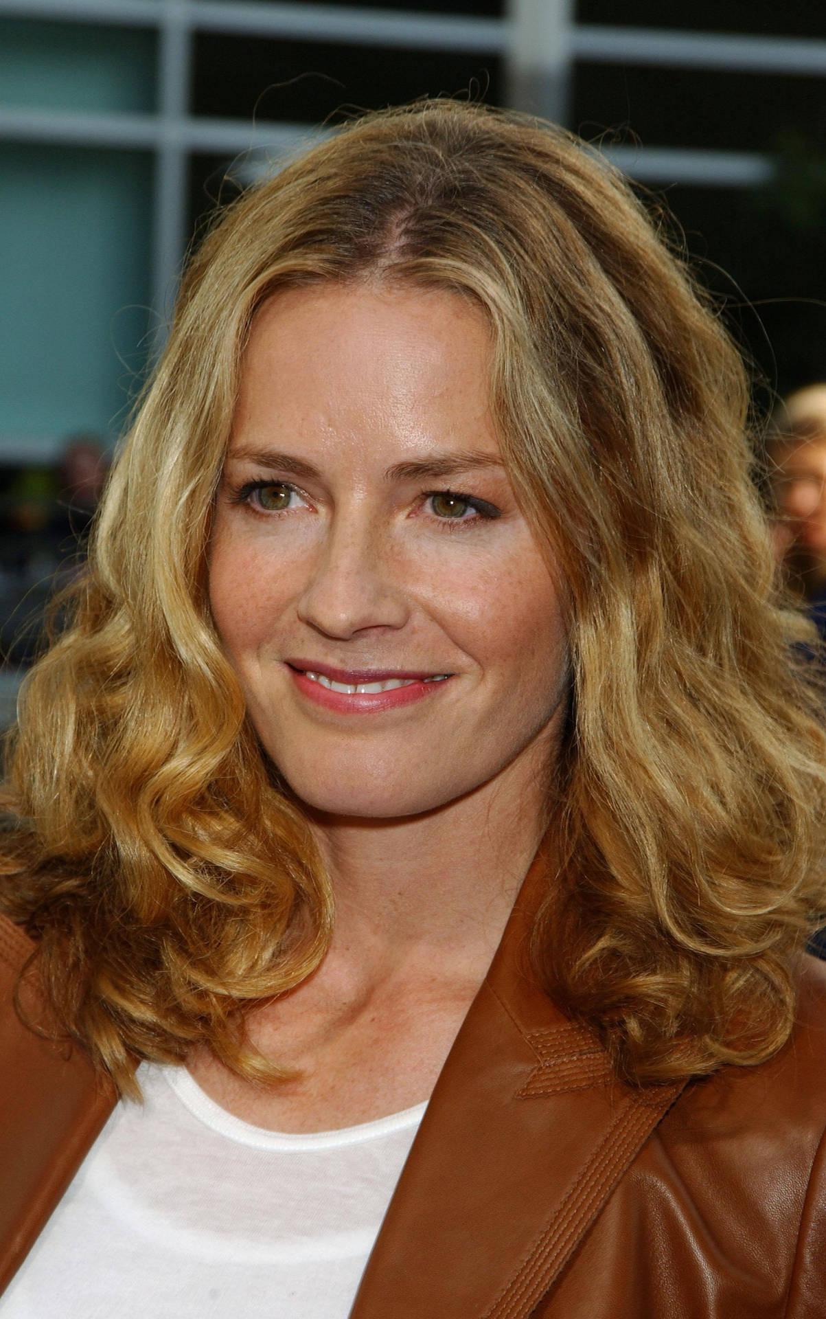 Hollywood Actress Elisabeth Shue In Close-up, Expressing Joy Background