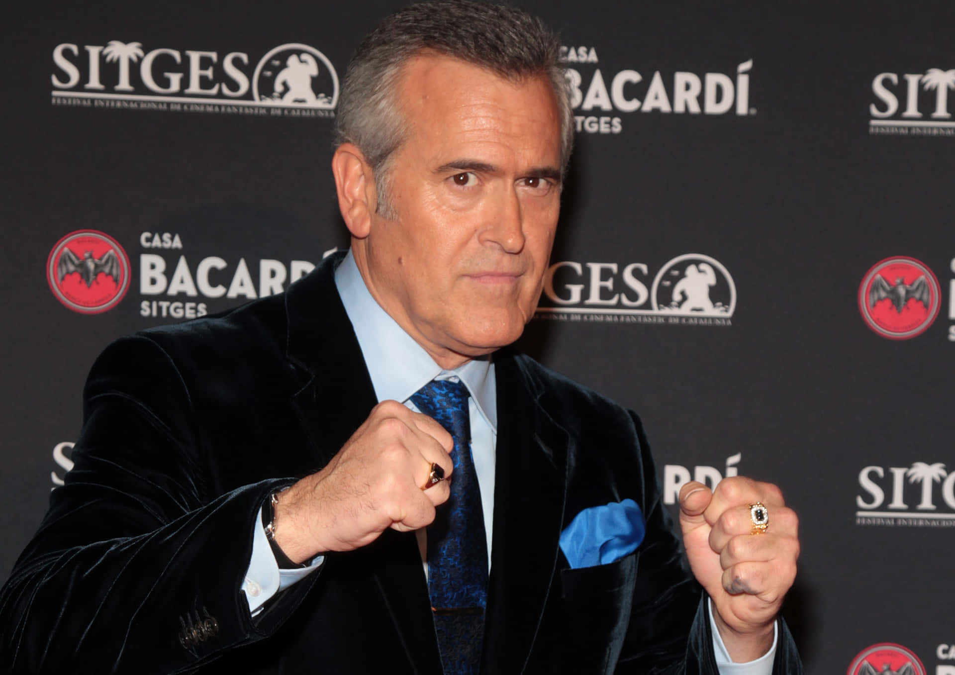 Hollywood Icon - Bruce Campbell In Action Background