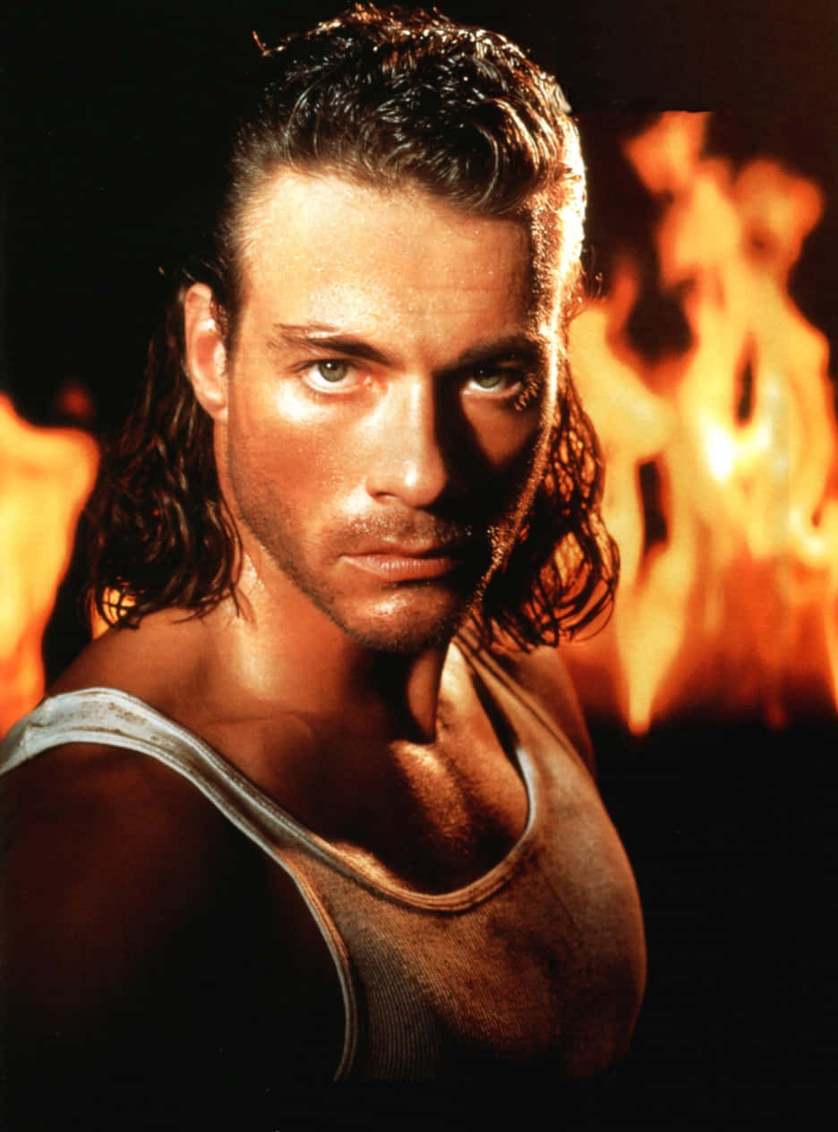 Hollywood Icon Jean-claude Van Damme Showcasing His Timeless Charisma. Background