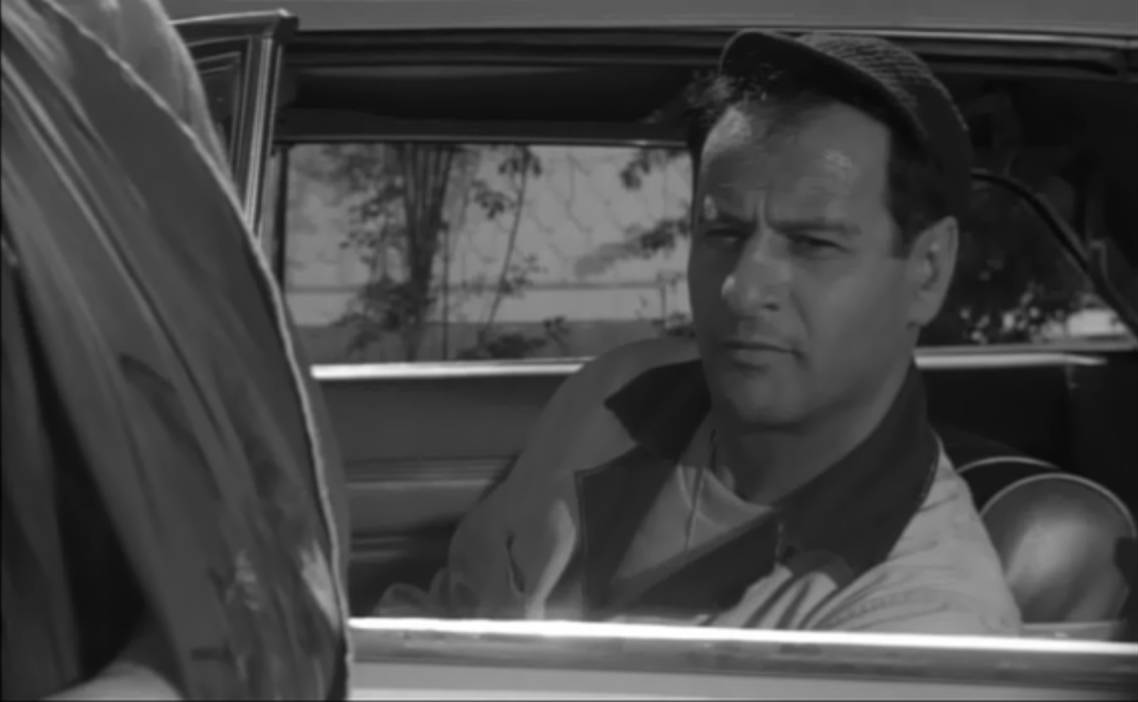 Hollywood Legend Eli Wallach Sitting In A Vintage Car. Background