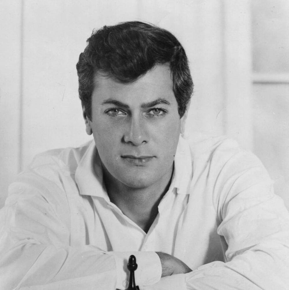 Hollywood Legend Tony Curtis In Expressive Black And White Portrait.