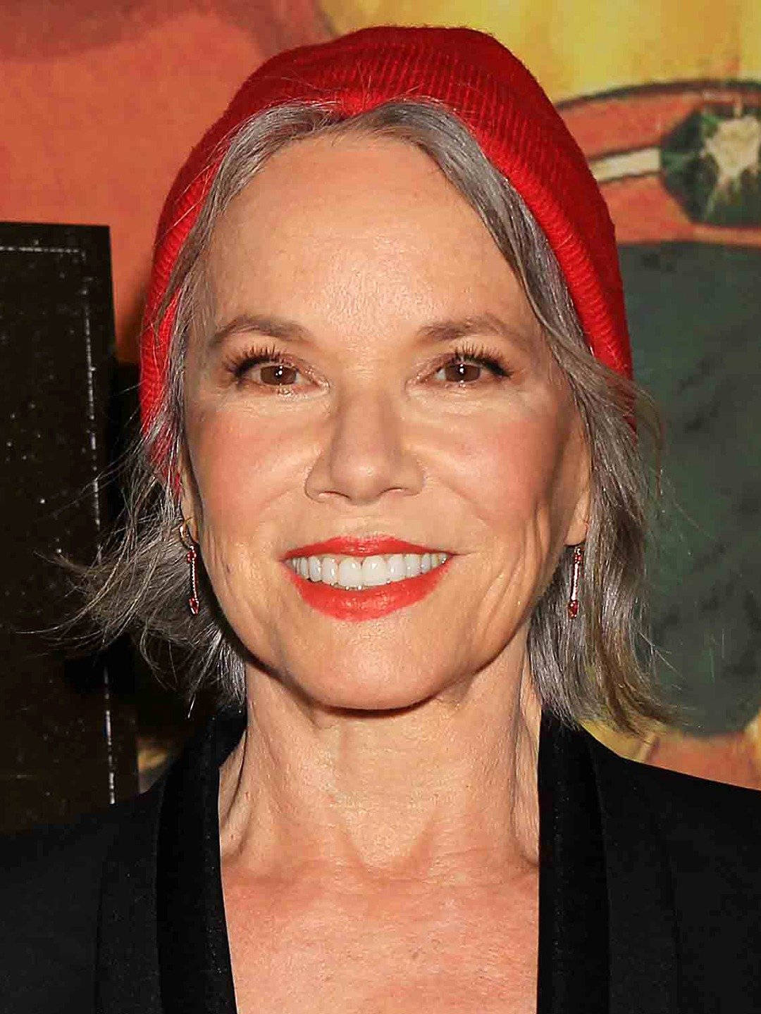 Hollywood Star Barbara Hershey With A Red Beanie Background