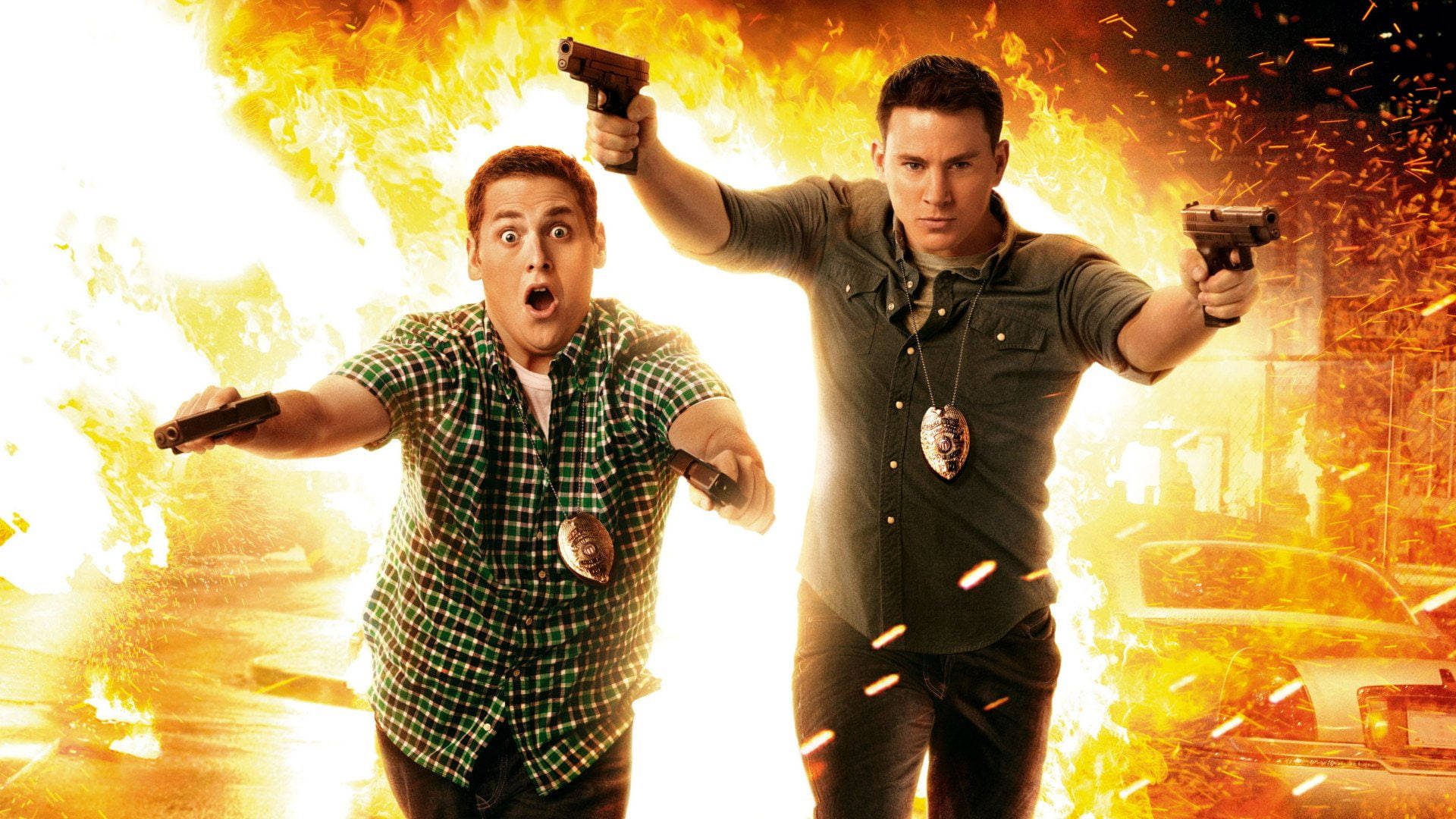 Hollywood Stars Channing Tatum And Jonah Hill In A Light-hearted Moment. Background