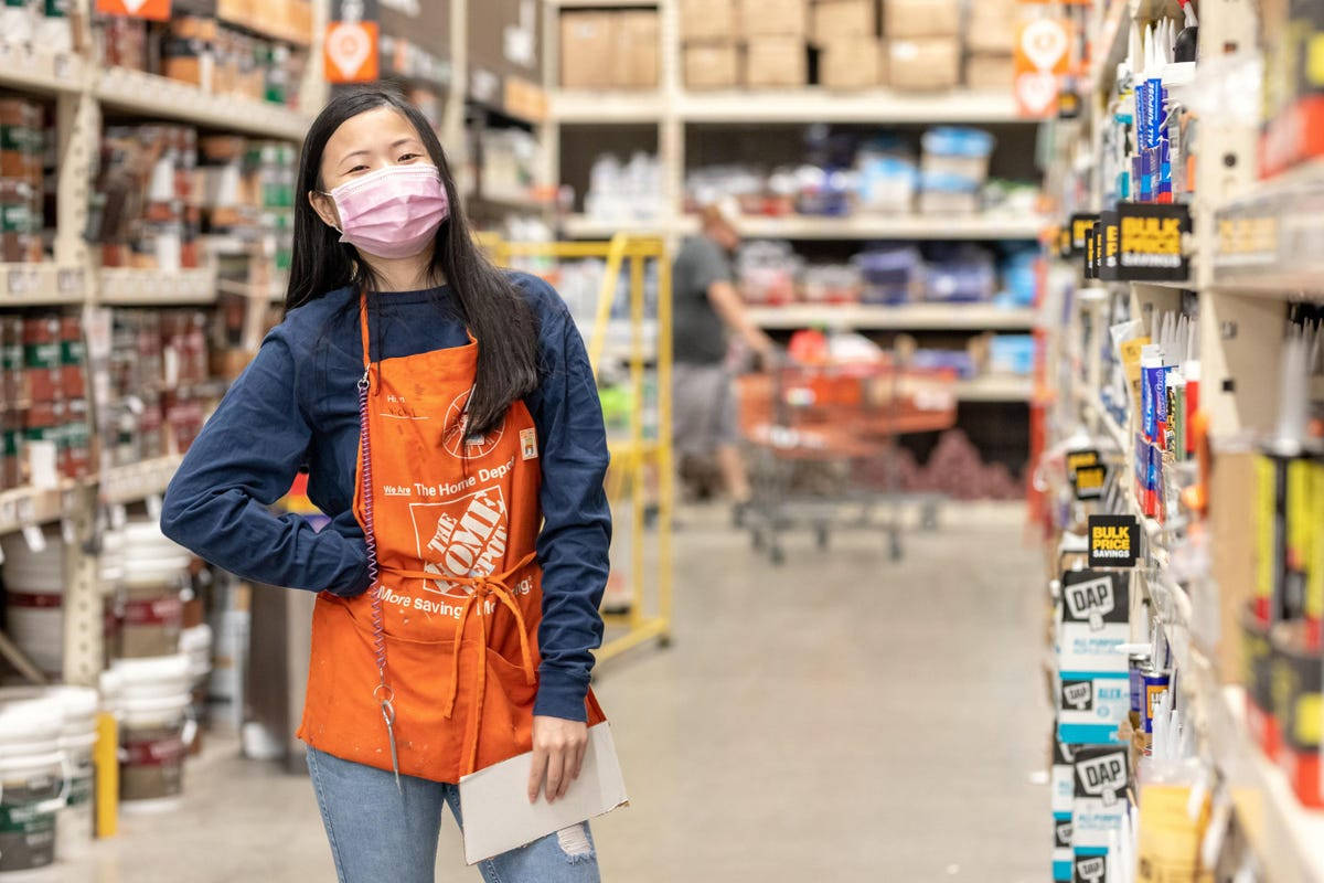 Home Depot Employee Posing Background