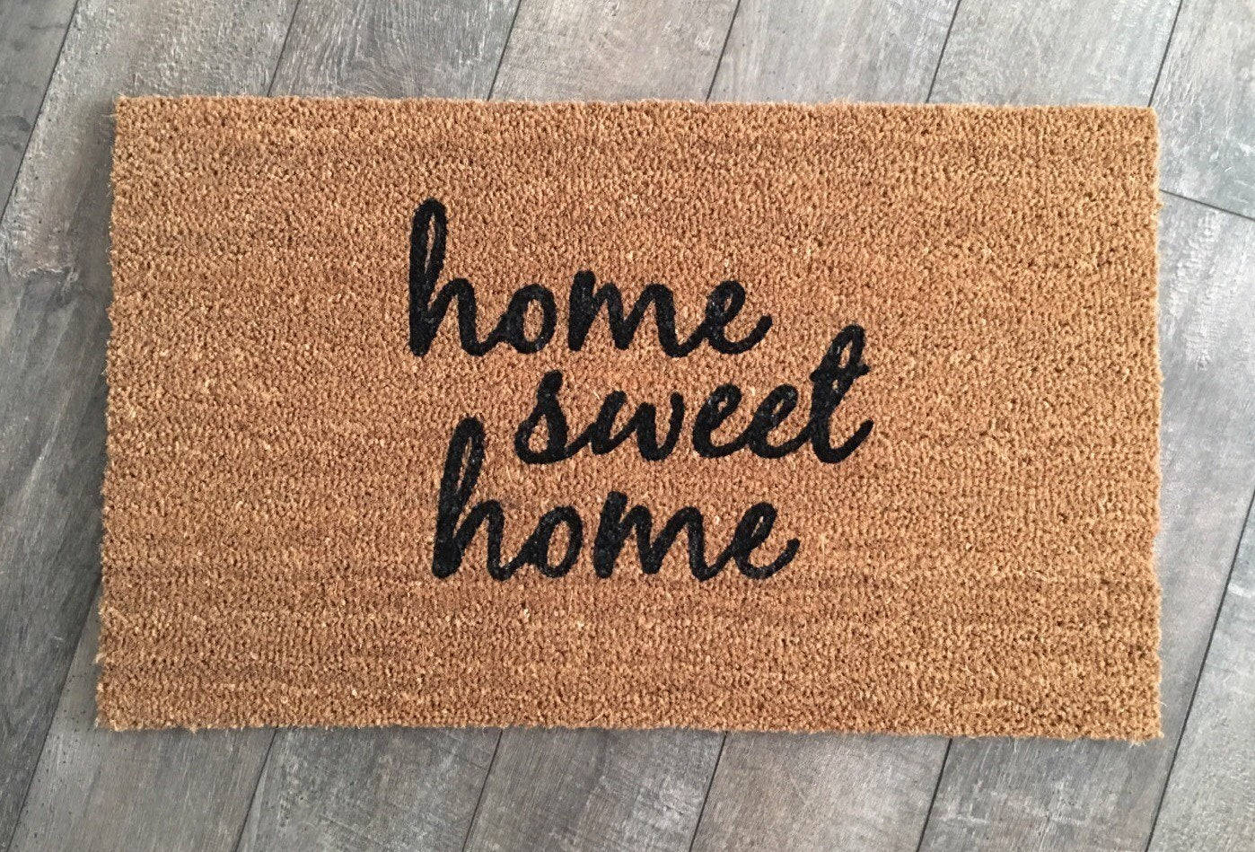 Home Sweet Home On Brown Rug Background