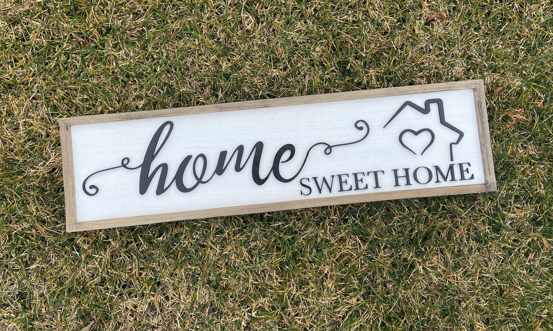 Home Sweet Home On Grass Background