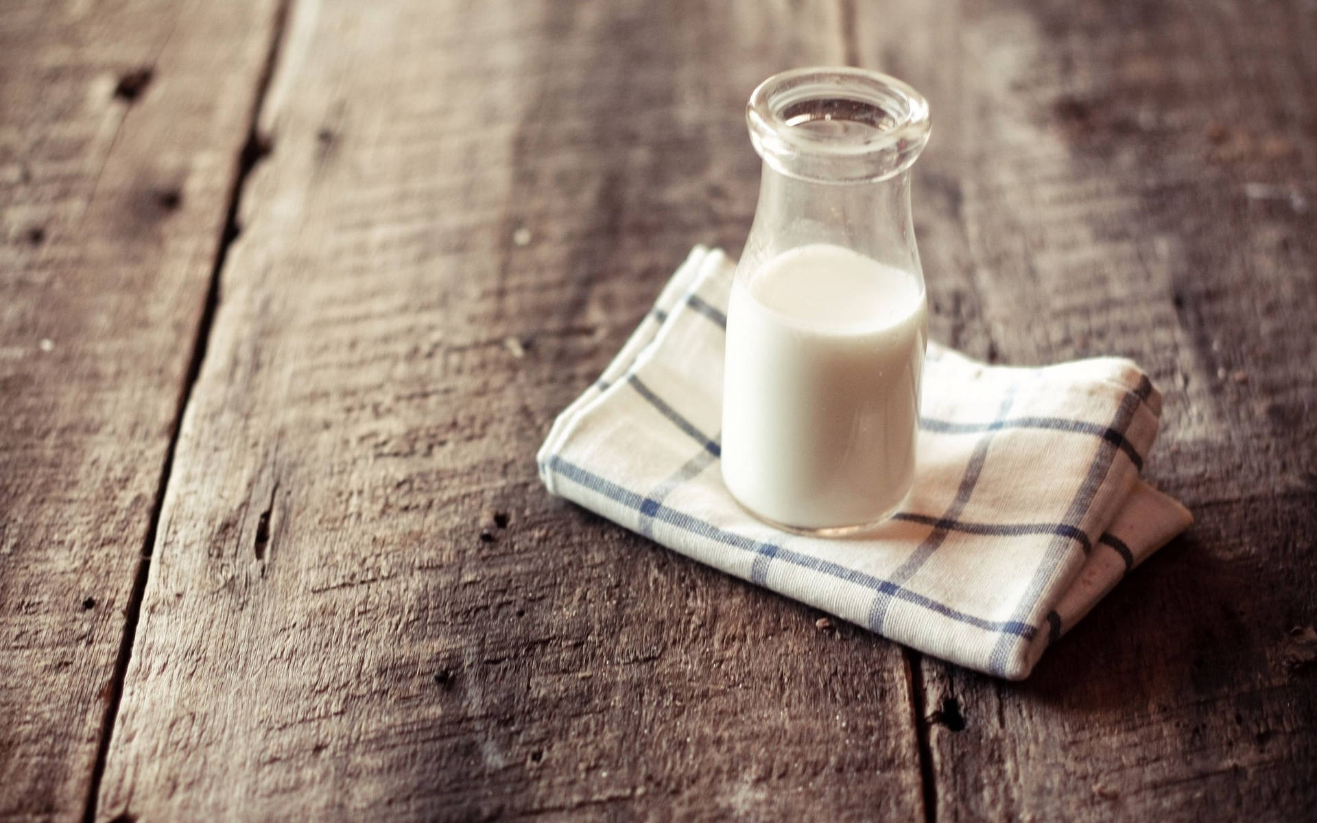 Homely Glass Of Milk On Top Of Wood Background