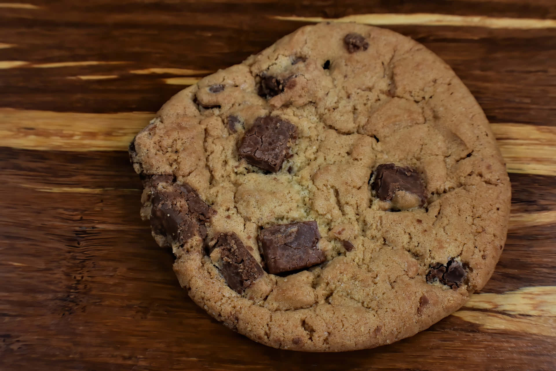 Homemade Chocolate Chip Cookie Wooden Background.jpg Background