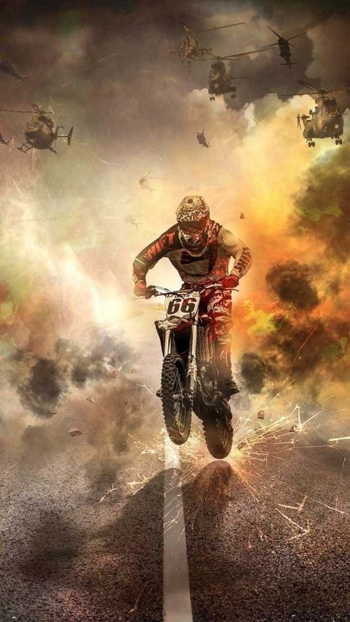 Honda Dirt Bike Biker Explosion Behind Background