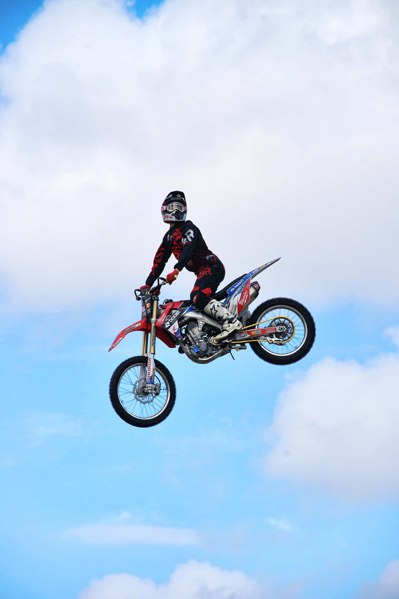 Honda Dirt Bike Posing Clear Skies Background