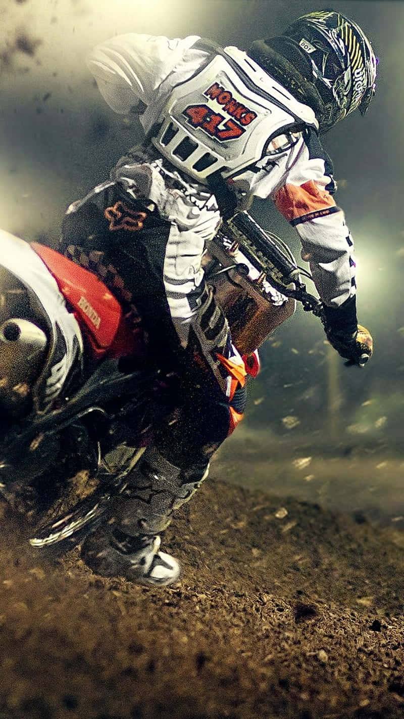 Honda Dirt Bike Riding Through Off Road Background