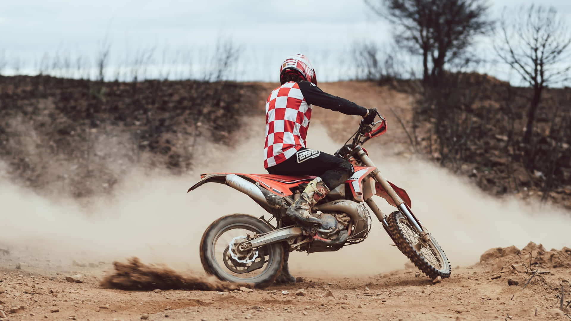 Honda Dirt Bike Smoky Off Road Trail Background