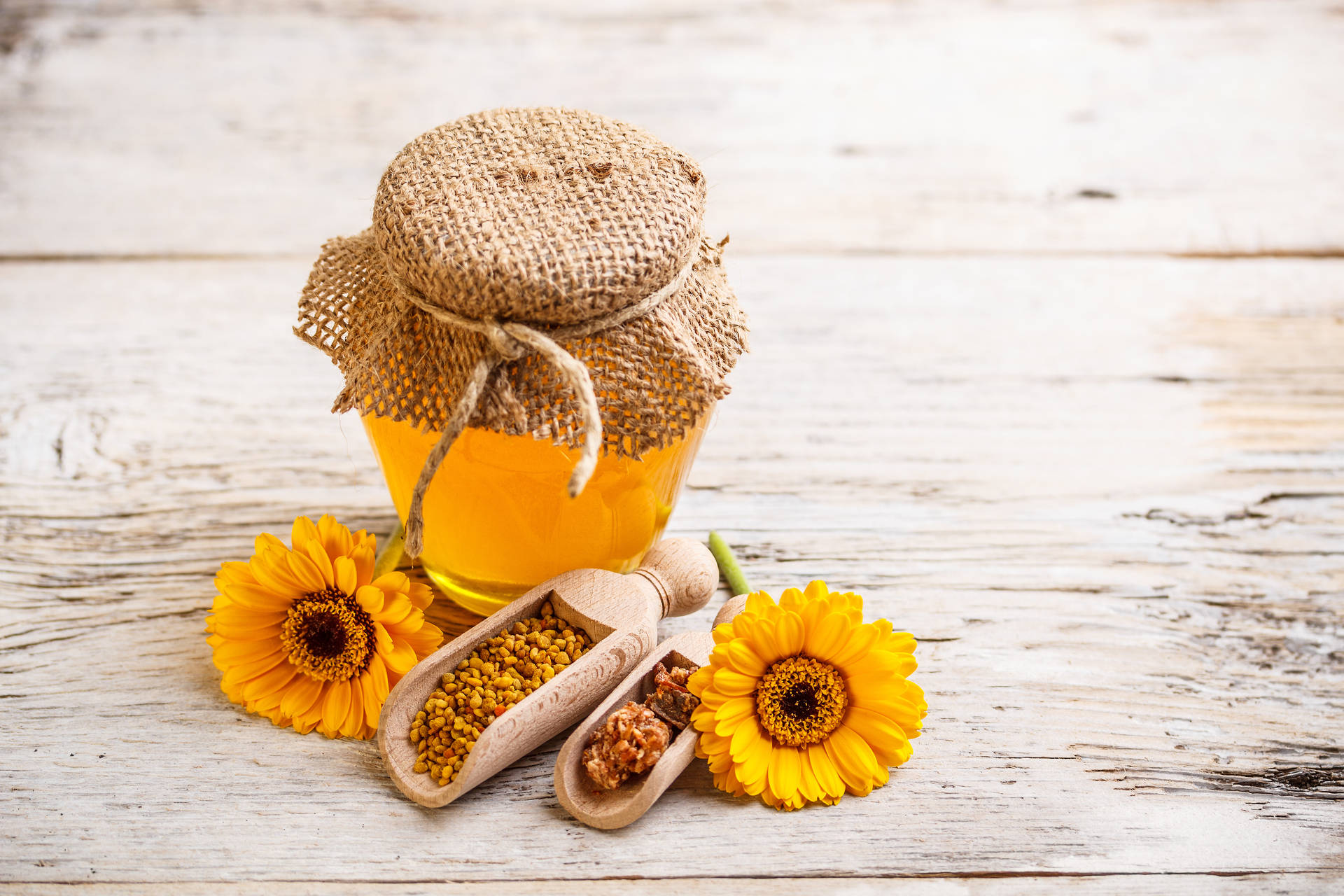 Honey And Propolis On A Table Background