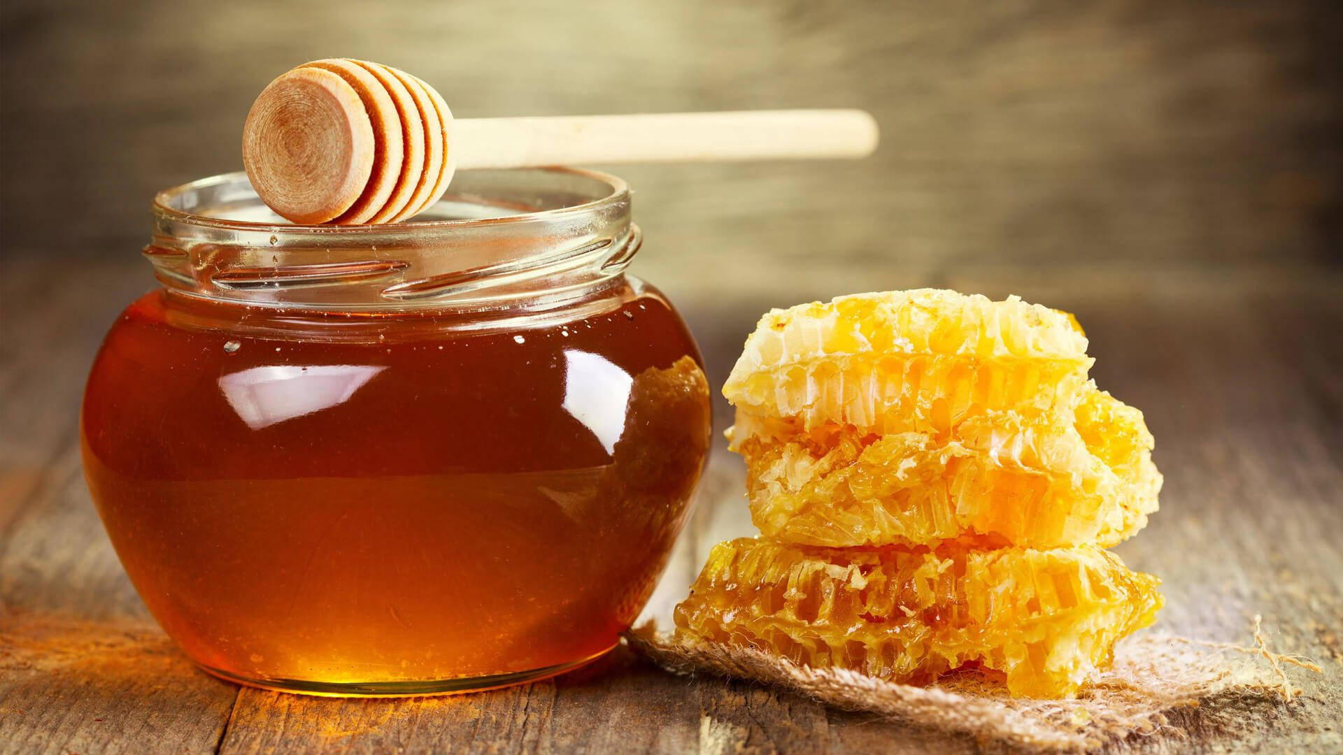 Honey Jar And Honeycomb Background