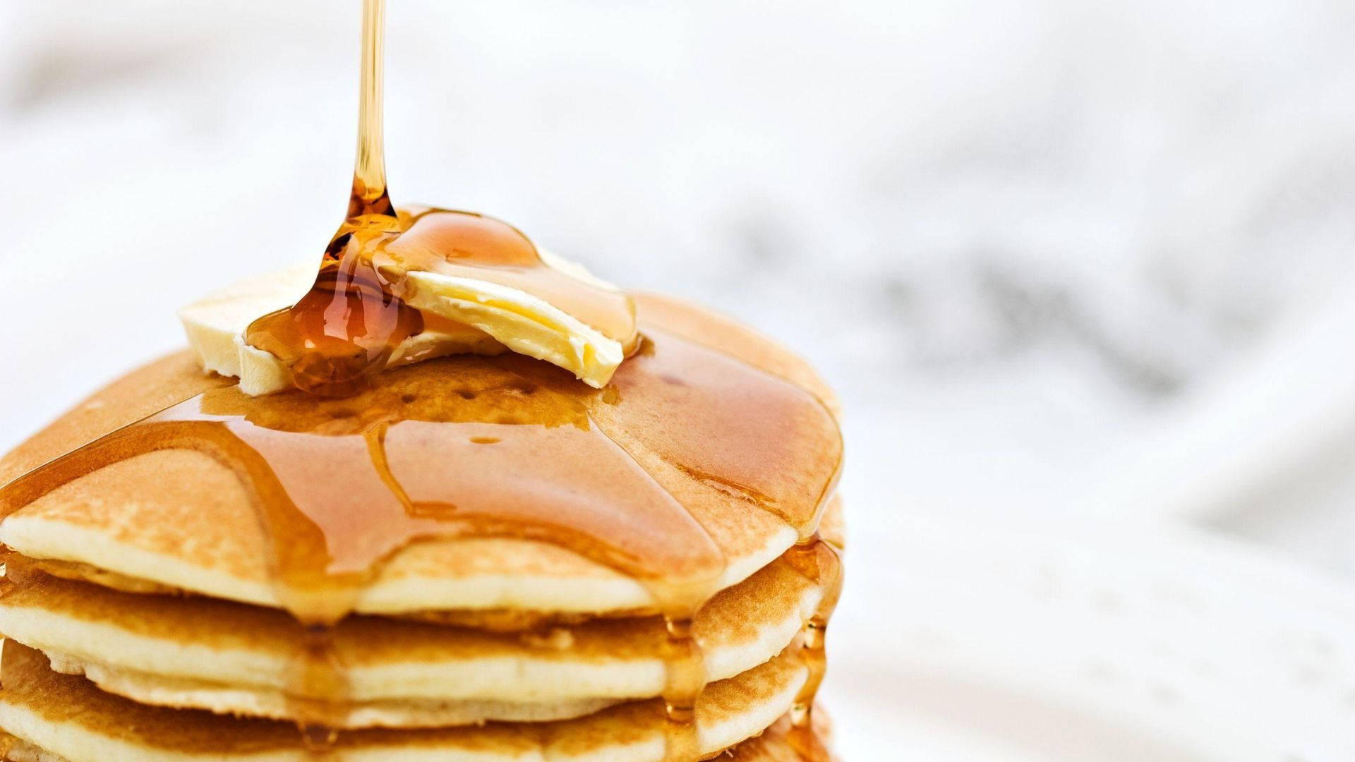 Honey On Pancakes Background