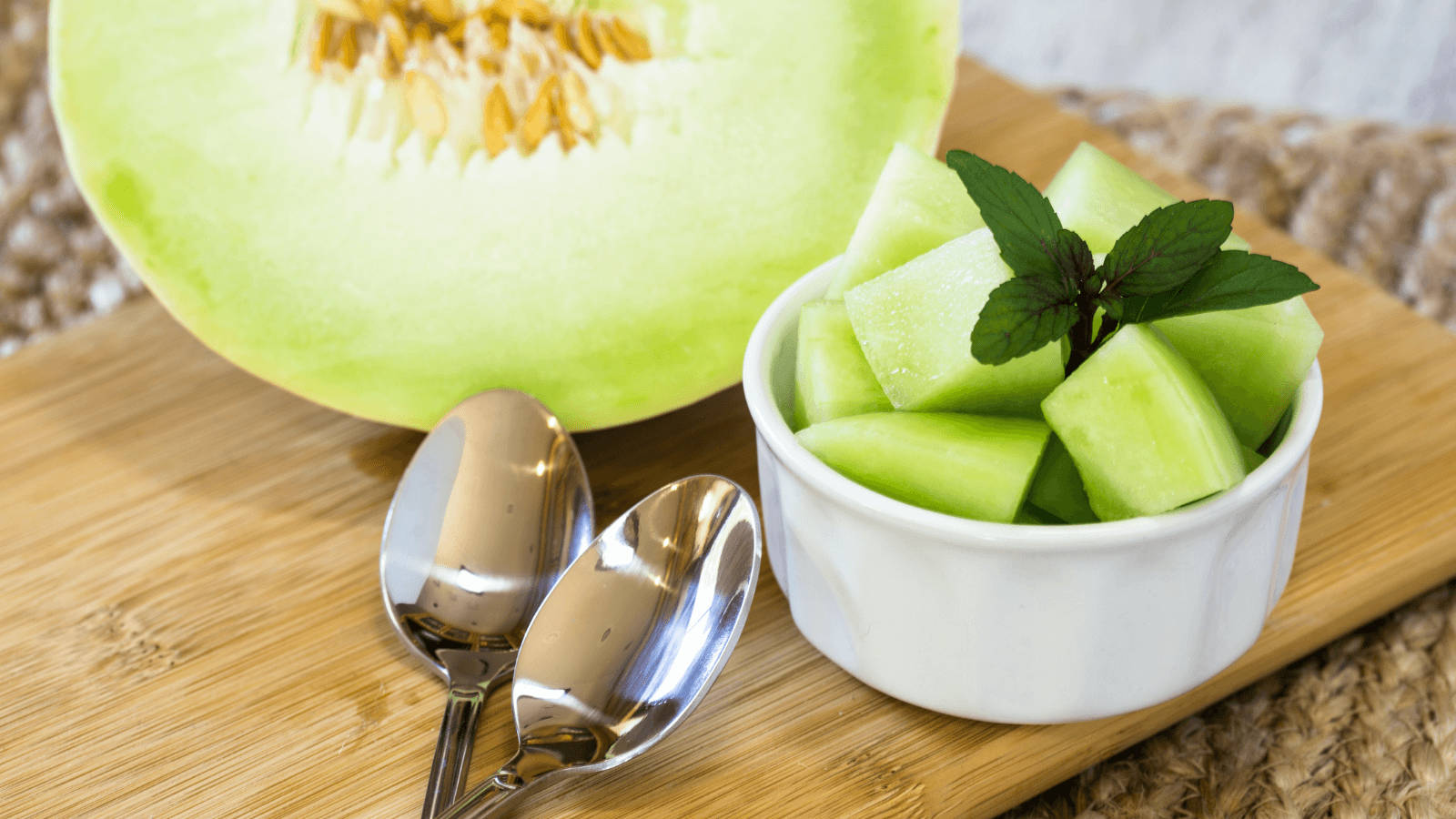 Honeydew Melon On A Cup Background