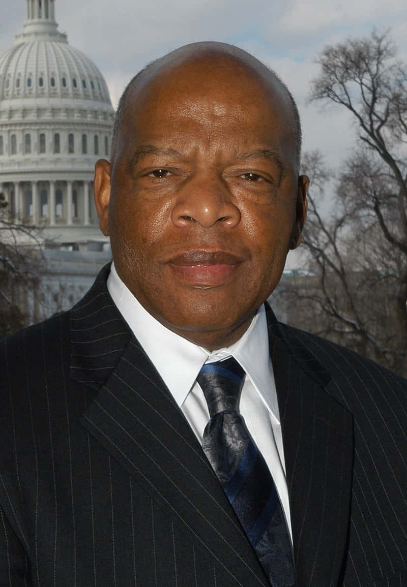 Honorable John Lewis In Front Of The Iconic White House Background