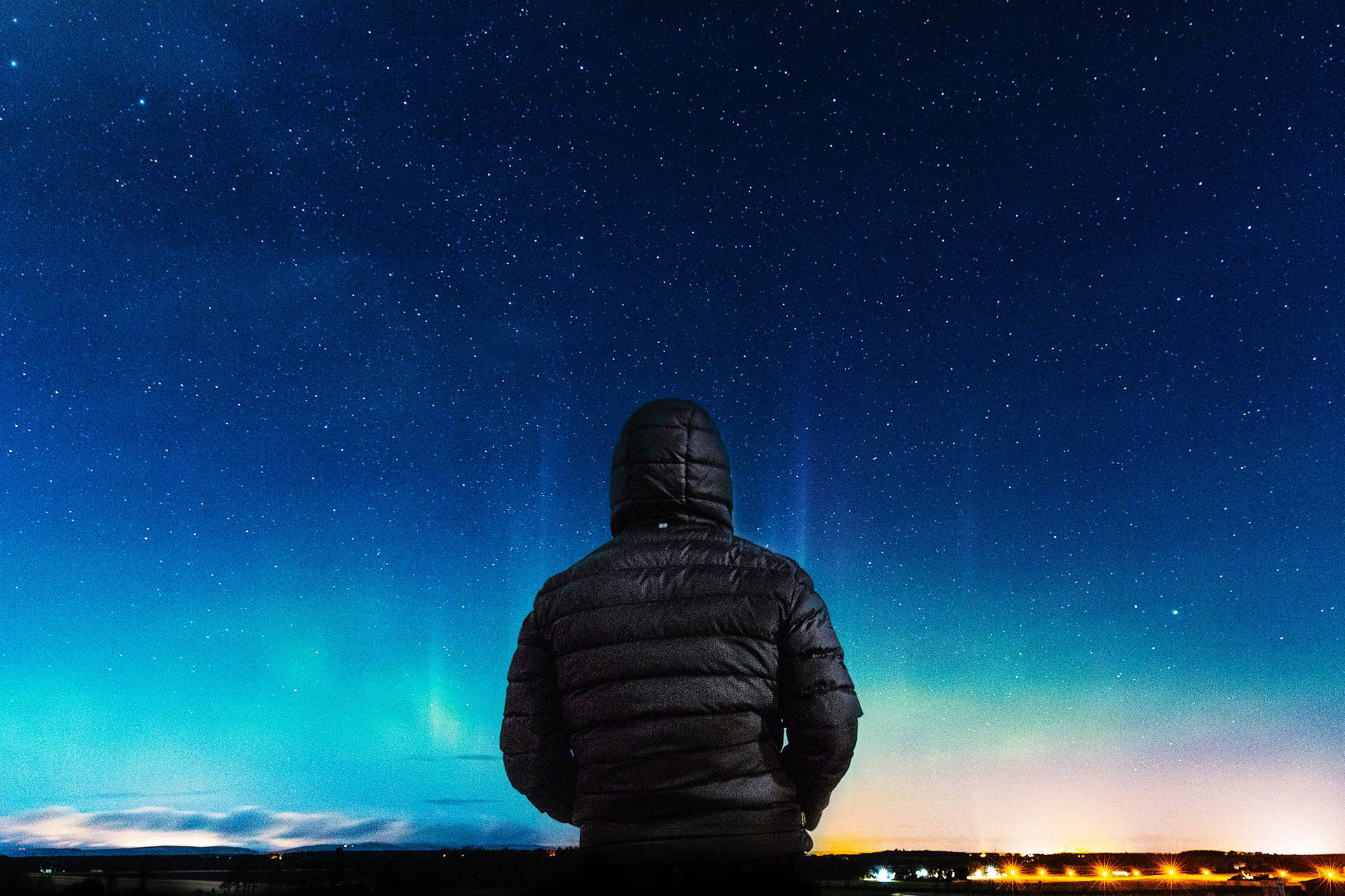 Hooded Guy In Blue Night Sky Background