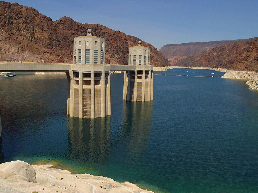 Hoover Dam Structures On Lake Background