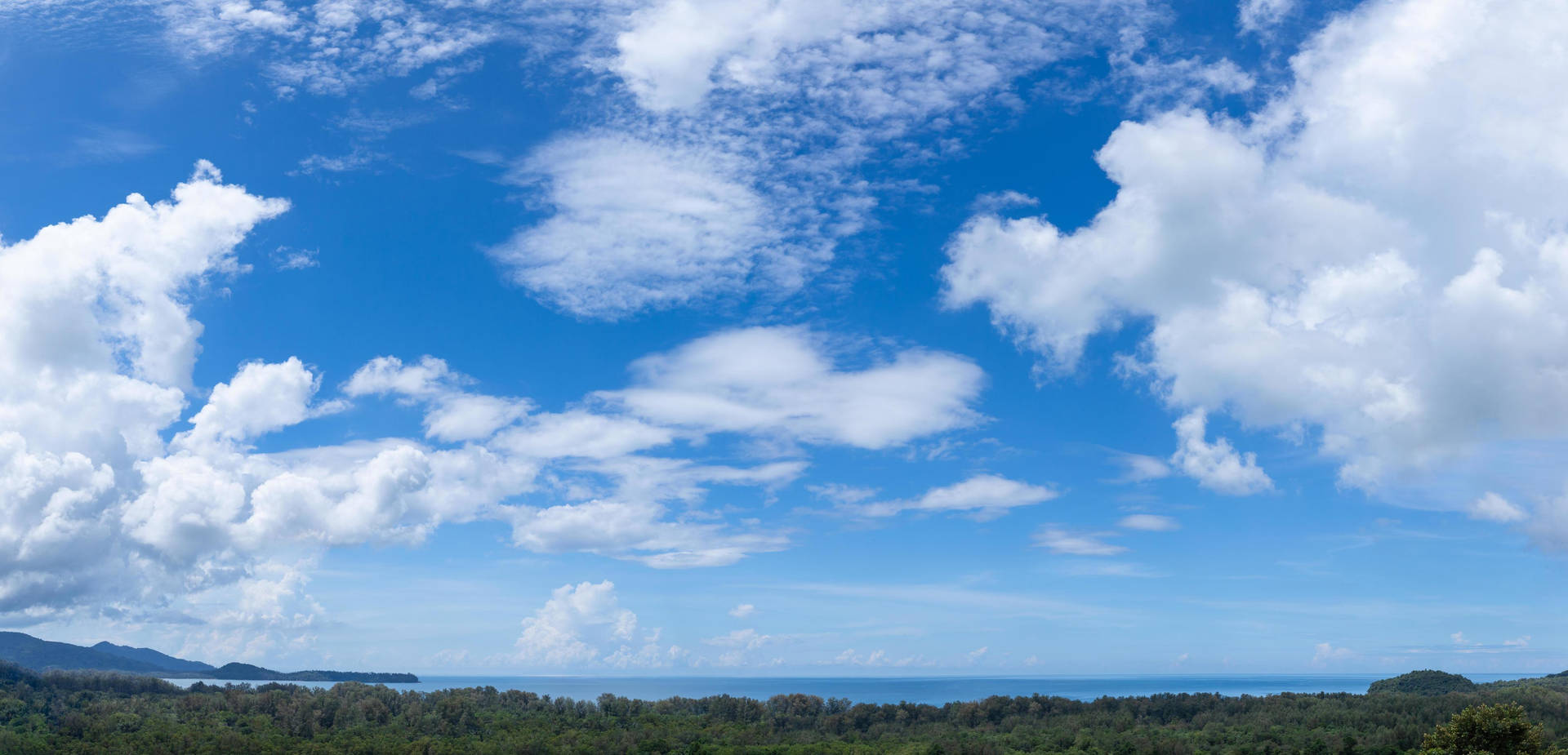 Horizon Between Sea And Cloudy Sky Background