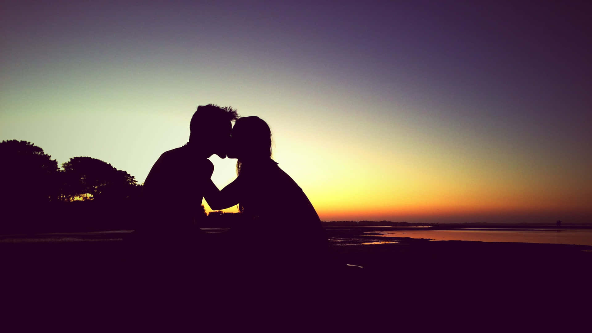 Horizontal Couple Kissing Their Lips