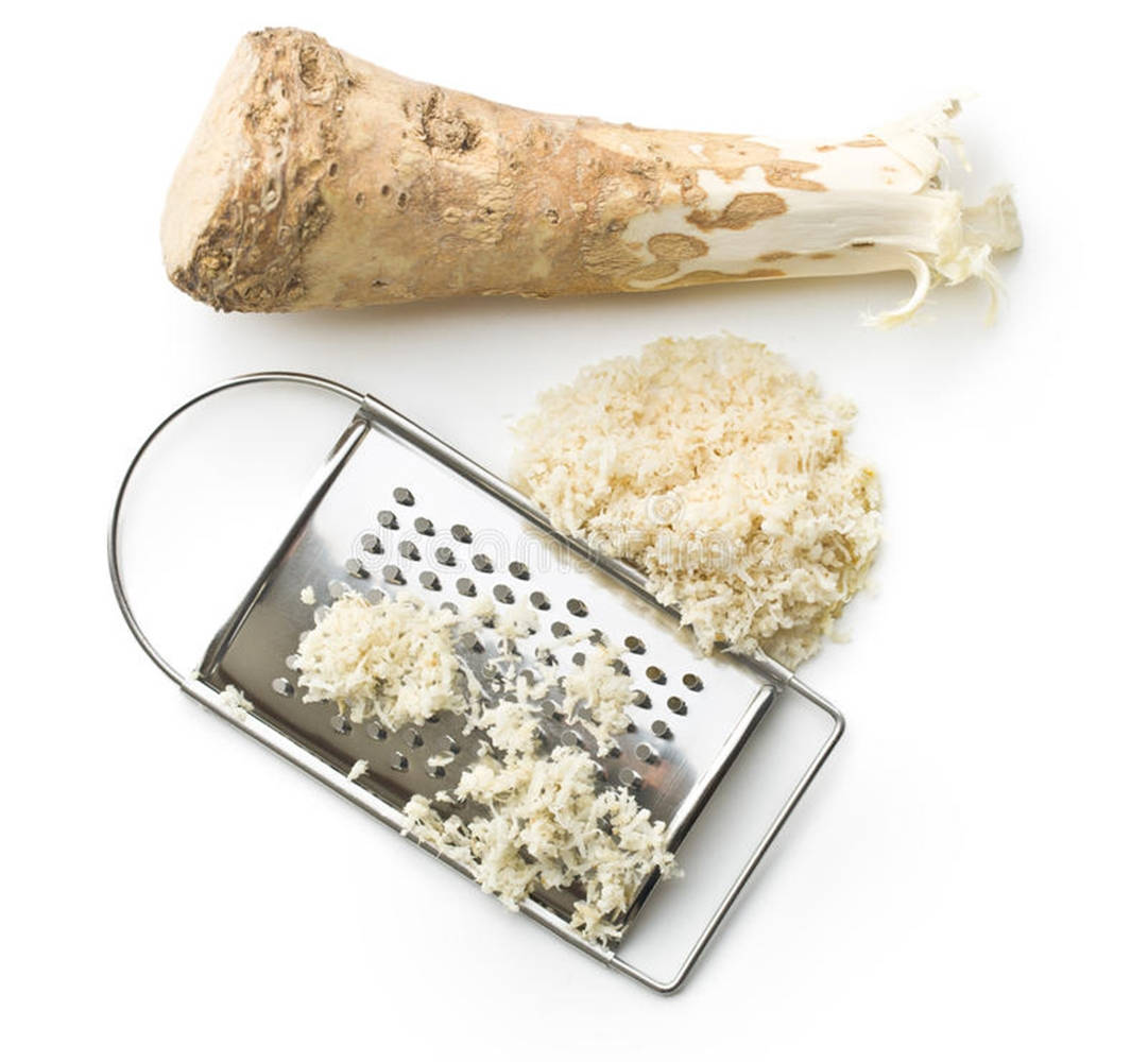 Horseradish With Cheese Grater Background