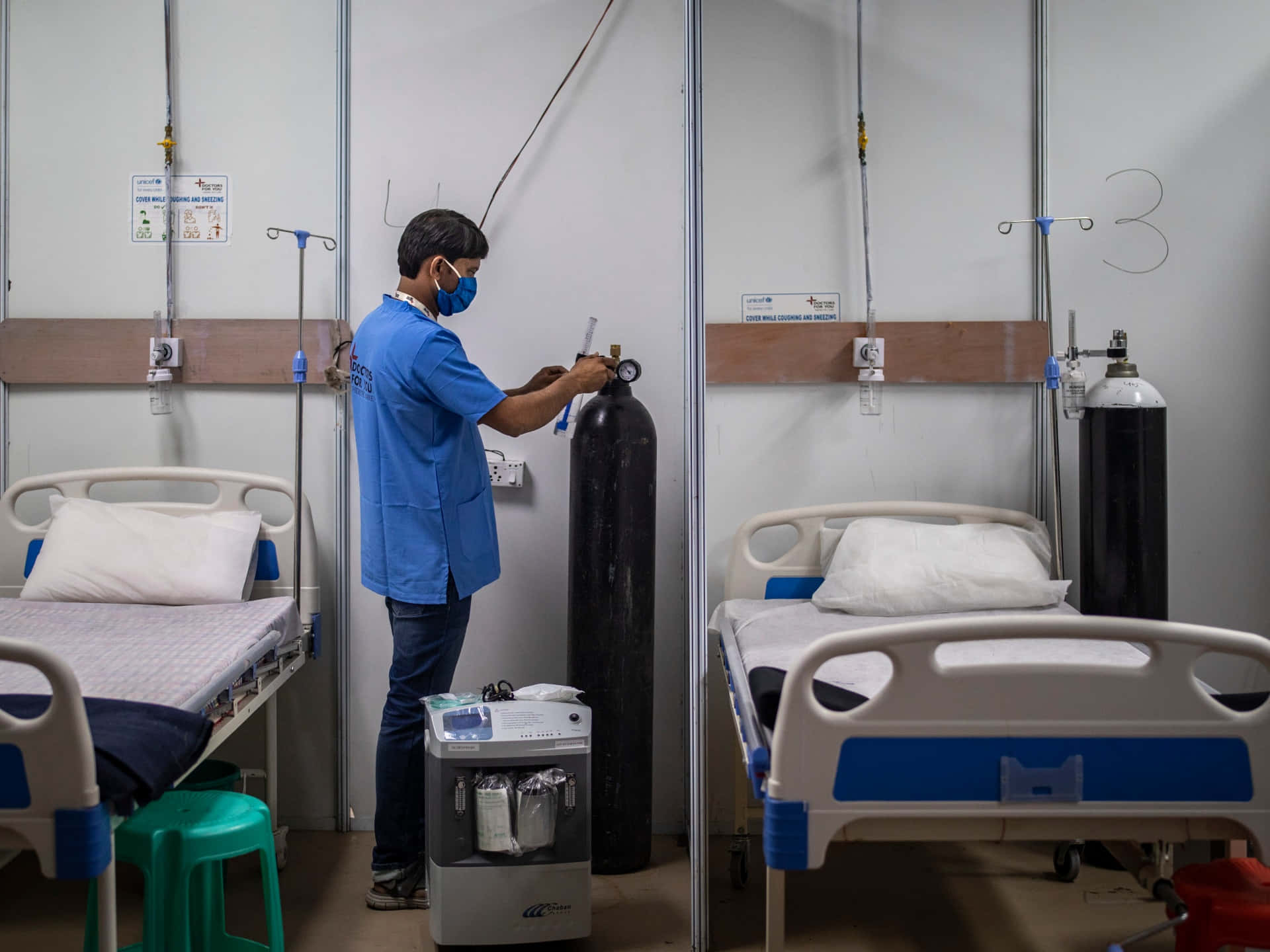 Hospital Bed With Nurse Fixing Oxygen Background