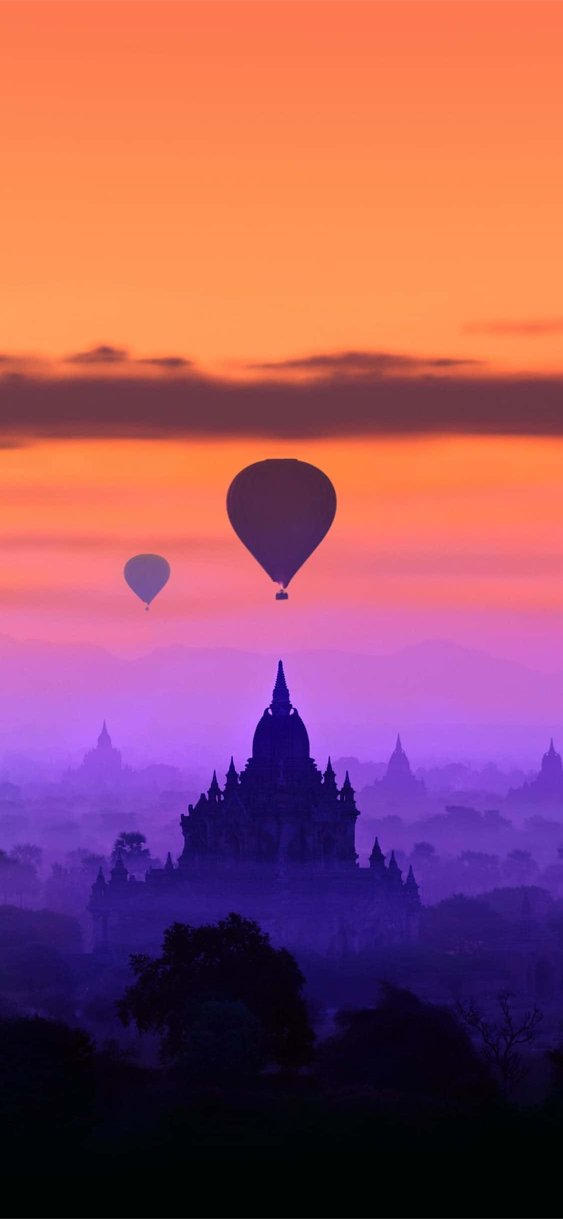 Hot Air Balloon In Purple Sky In Bagan, Near Mandalay