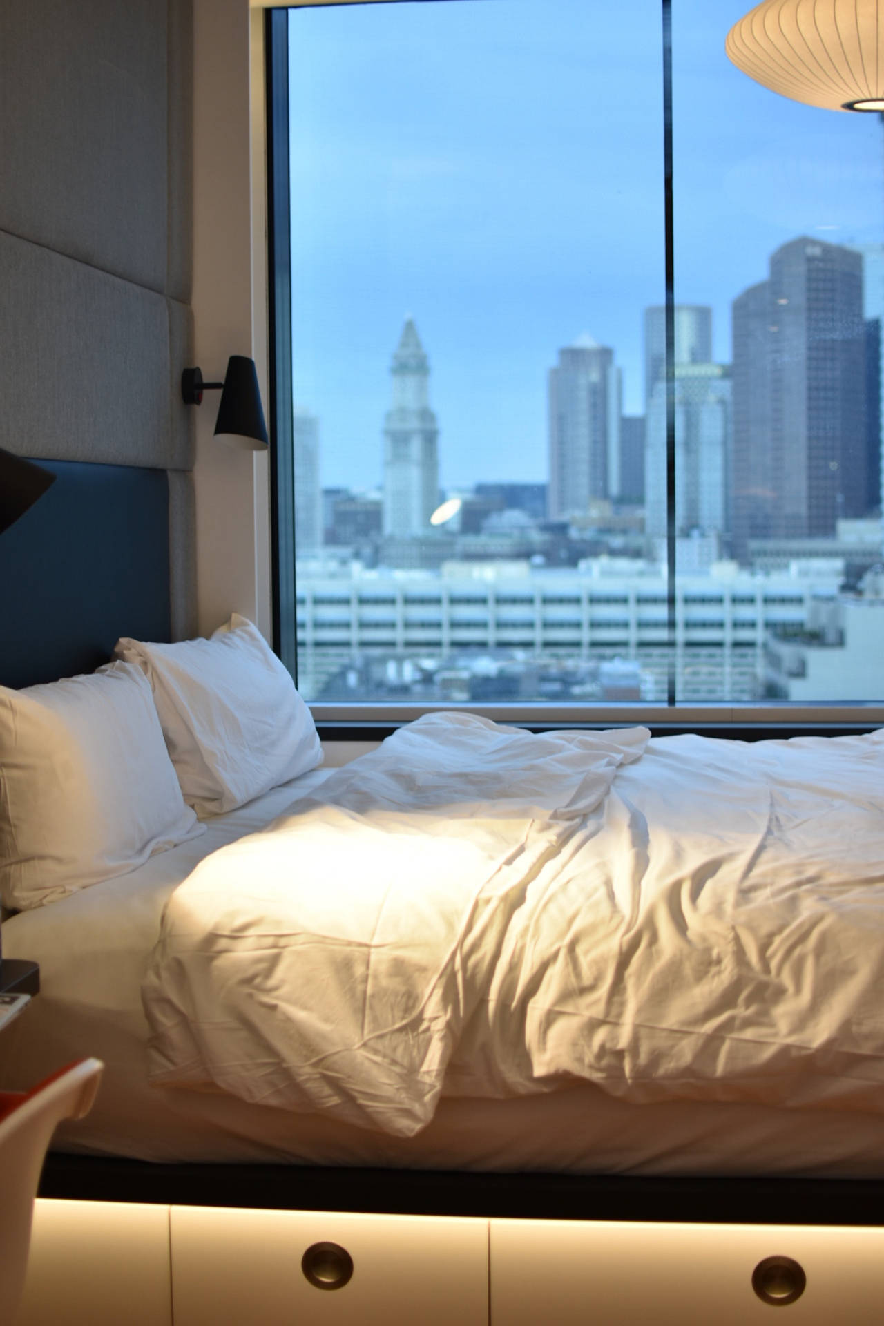 Hotel Bedroom With City View Background