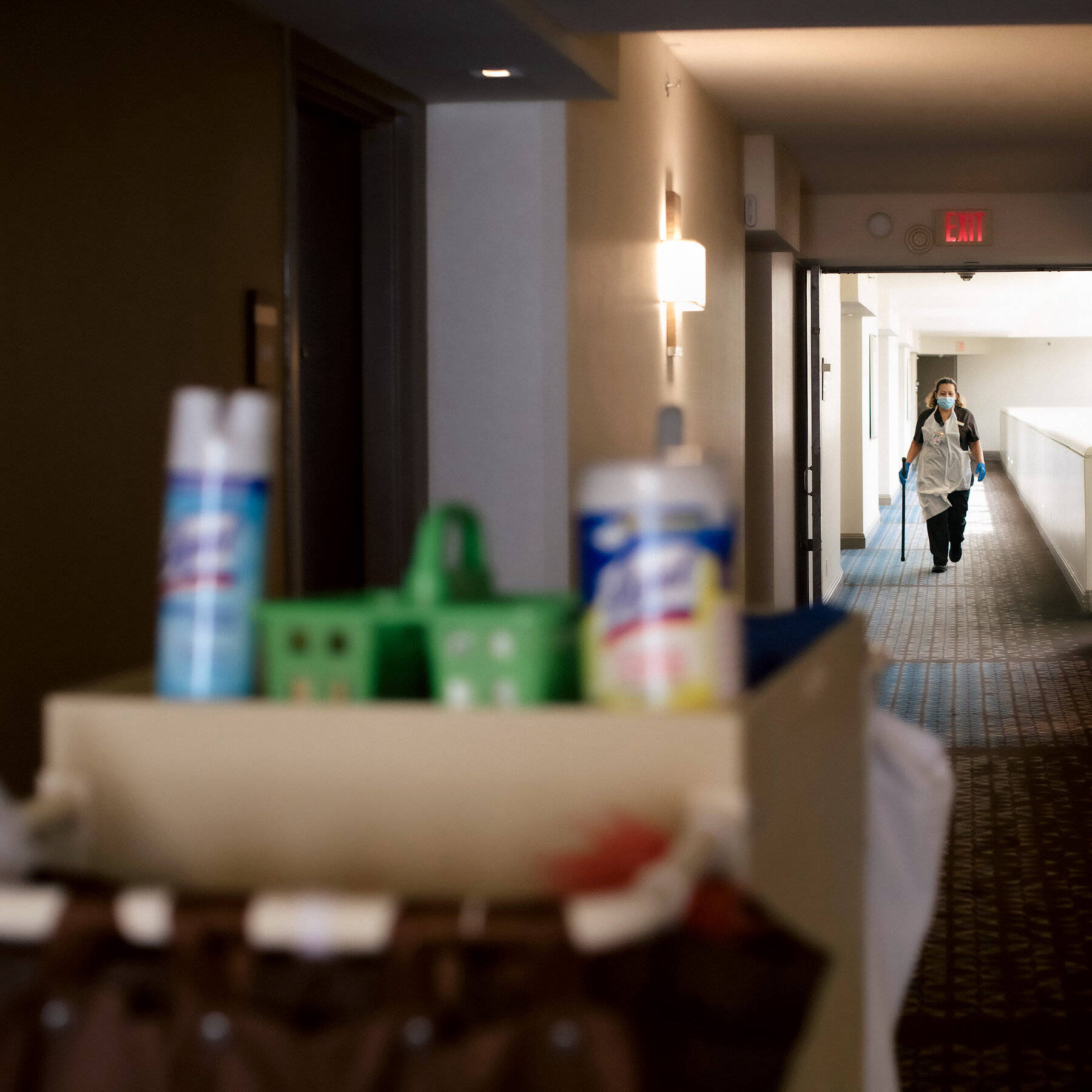 Hotel Housekeeper Tools Walking Lobby Background