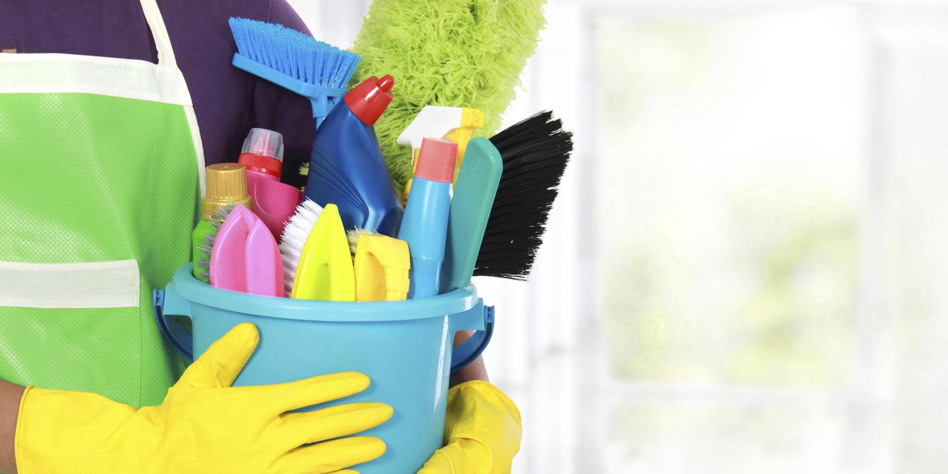 House Cleaning Materials In A Pail Background