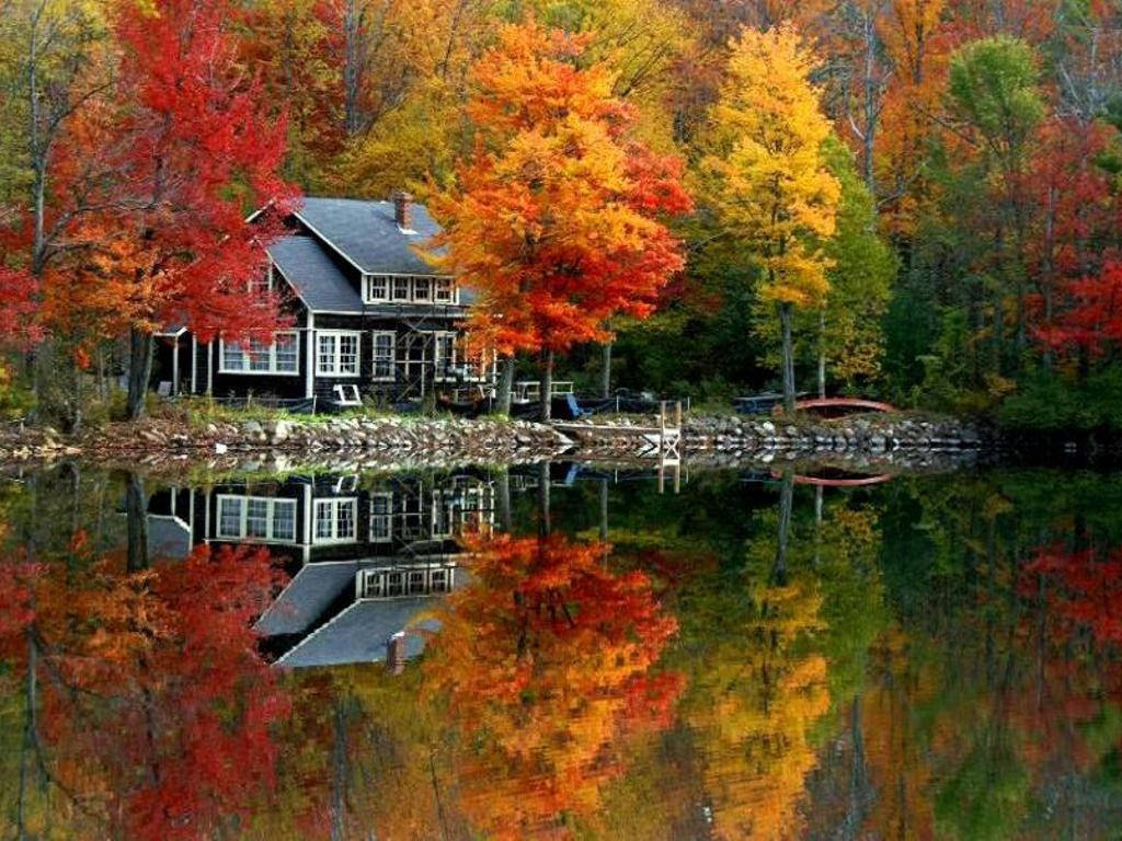 House On The Riverside During Fall