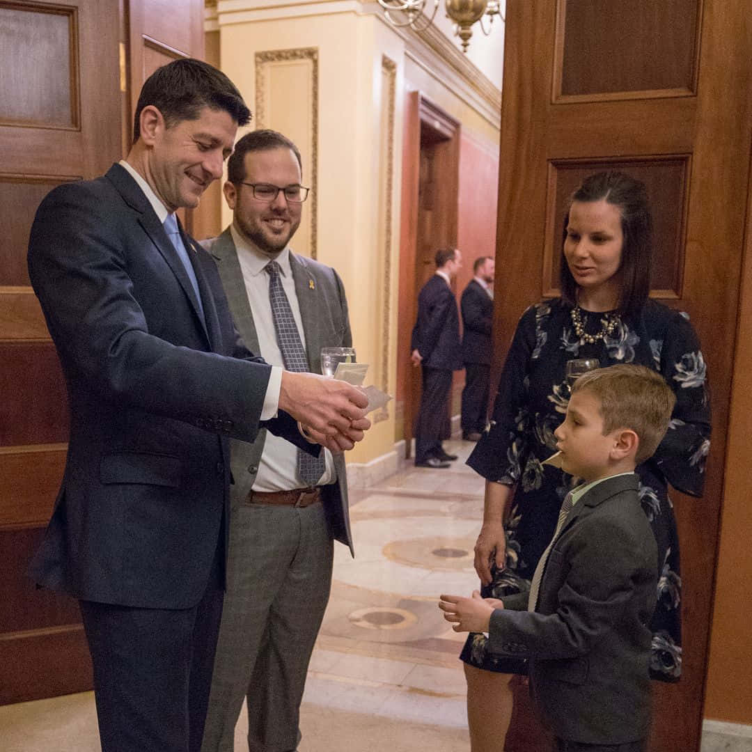 House Speaker Paul Ryan And Son Background
